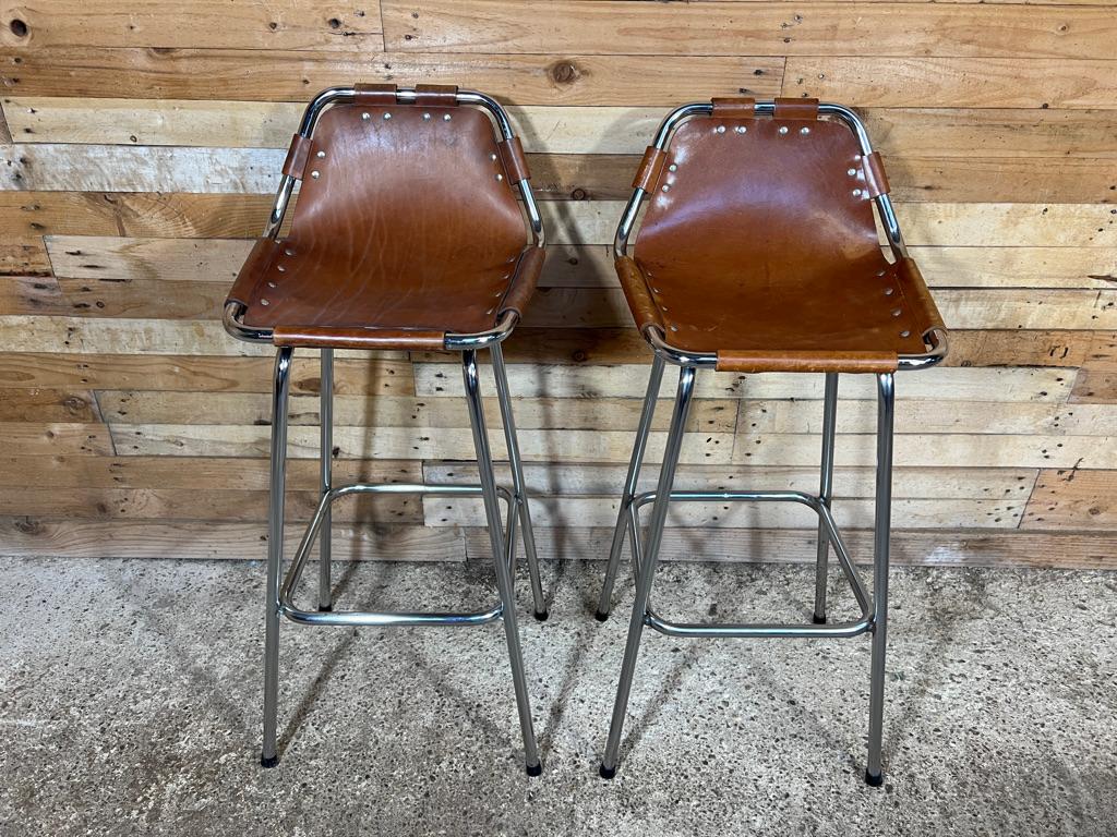 These are the rarest tallest stools by Charlotte Perriand available!

Sought after 2x leather Charlotte Perriand stools for Les Arcs, 1960. 

Two Charlotte Perriand stools from France, 

stunning stools very unusual and sought after, these were