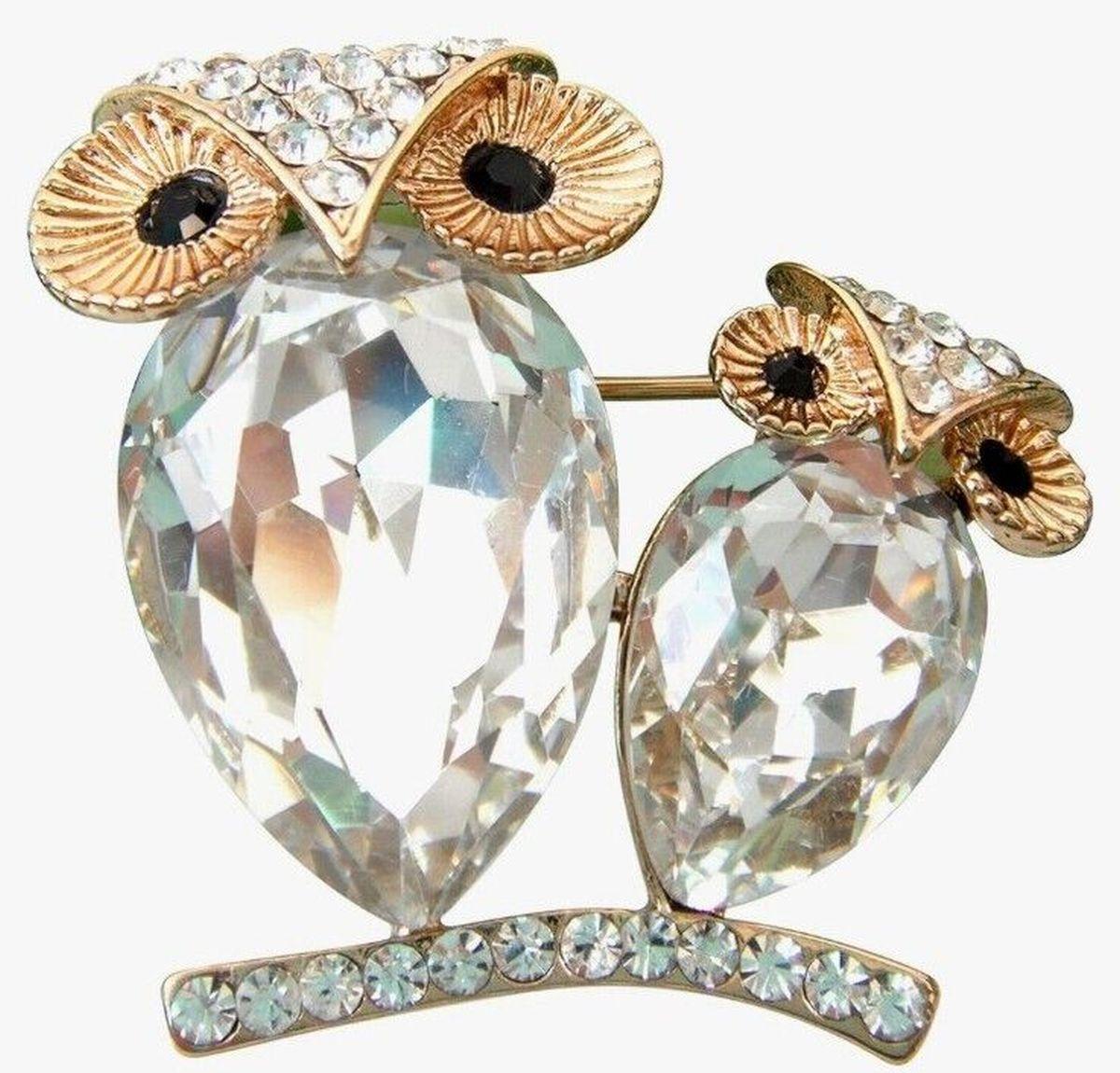 Simply Beautiful! A Delightful Vintage Statement 2 Owls Brooch featuring intricate details of 2 Owls with Hand set faceted Pear shaped Crystal Bodies and Sparkling Crystal accents. Dimensional Gold Tone mounting. Measuring approx. 1.25” high. More