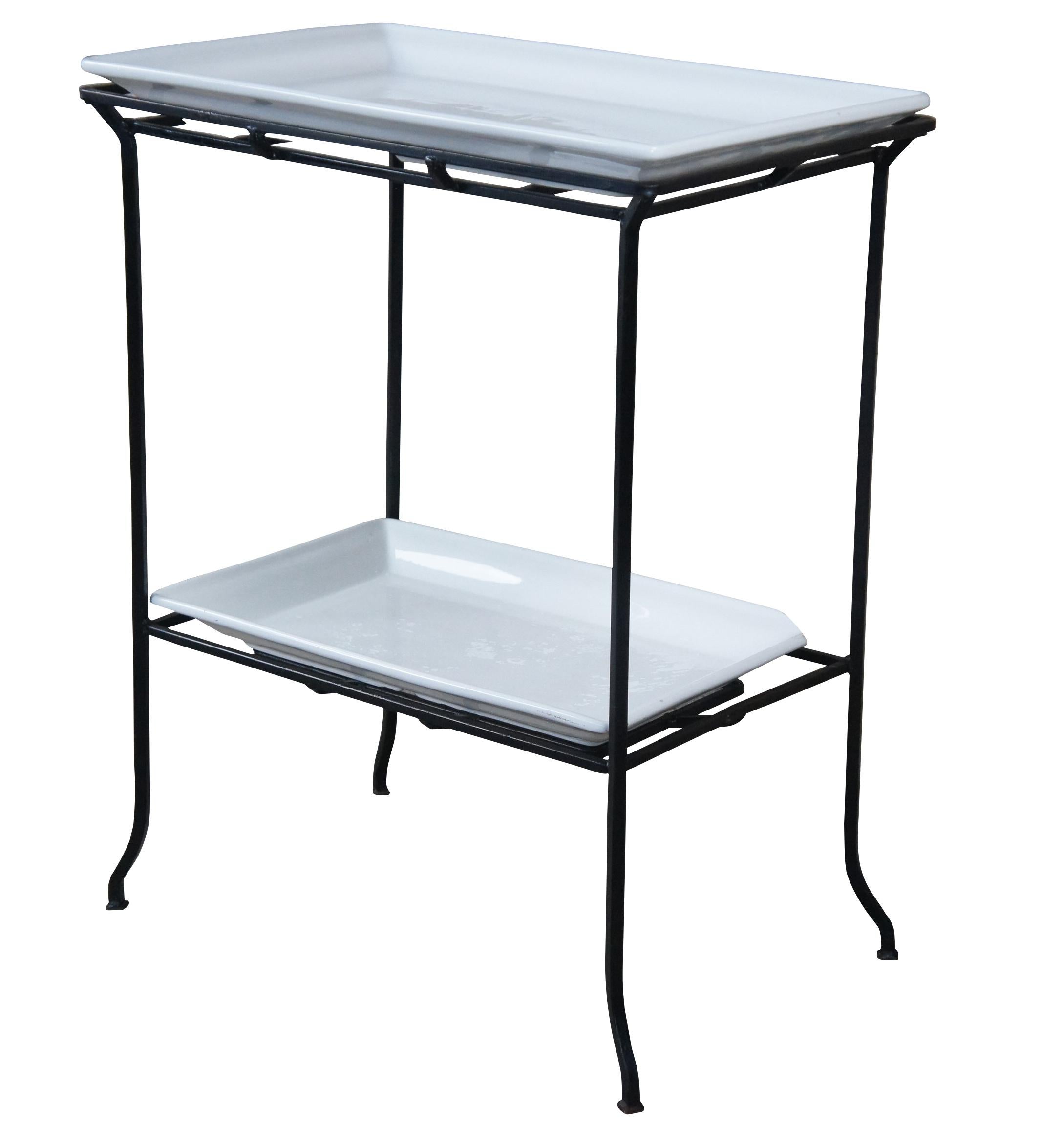 Industrial iron two tier table with porcelain inserts. Great for use as a dry bar, tray table or flower display.