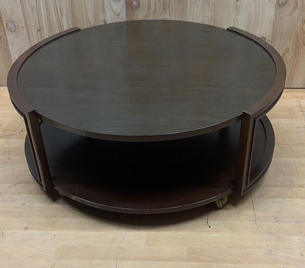 American Vintage Two Tier Round Wood Coffee Table on Casters For Sale