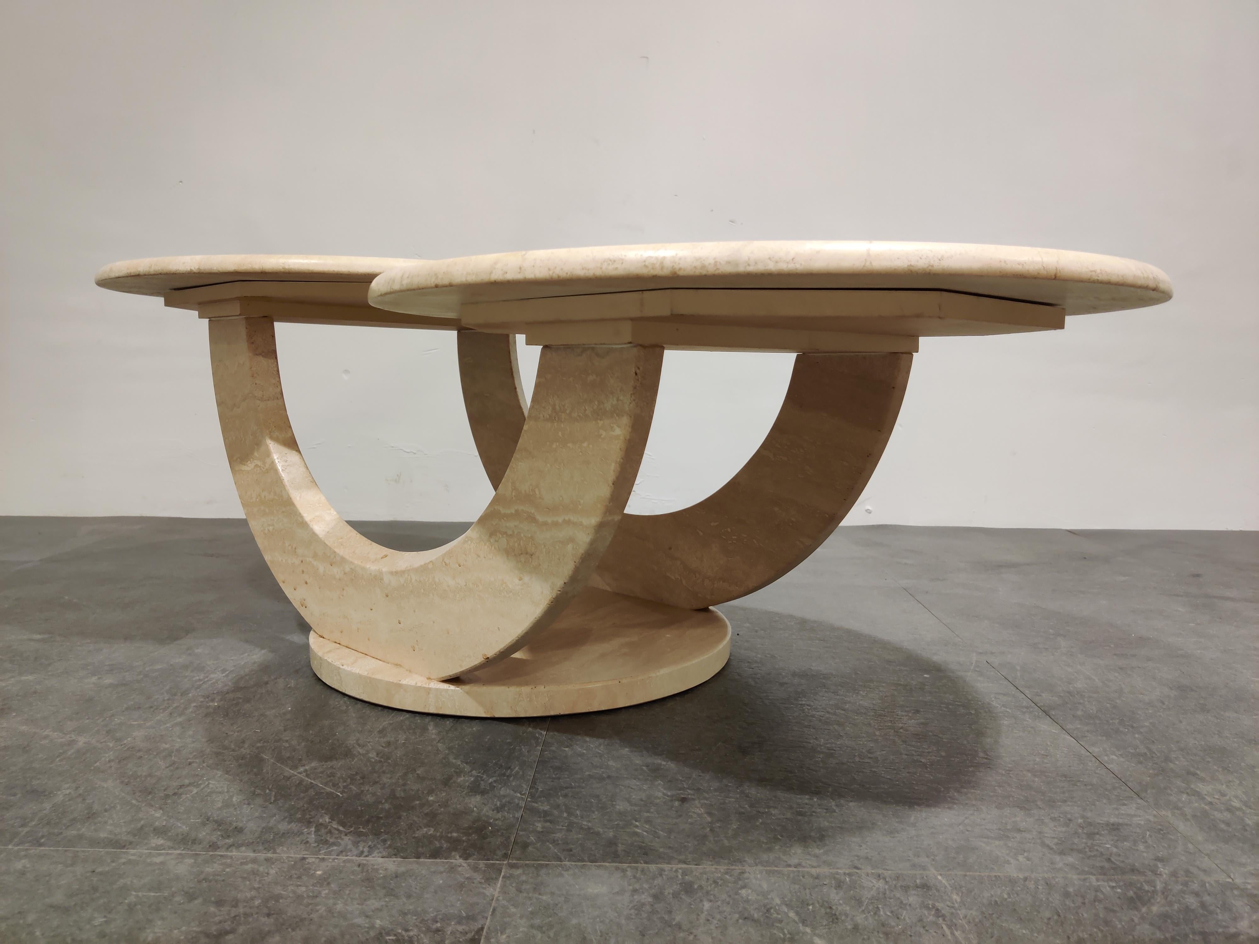Timeless travertine coffee tables with two round tops.

Beautiful arched base.

Good condition.

1970s - Italy

Dimensions:
Height: 42cm/16.53
