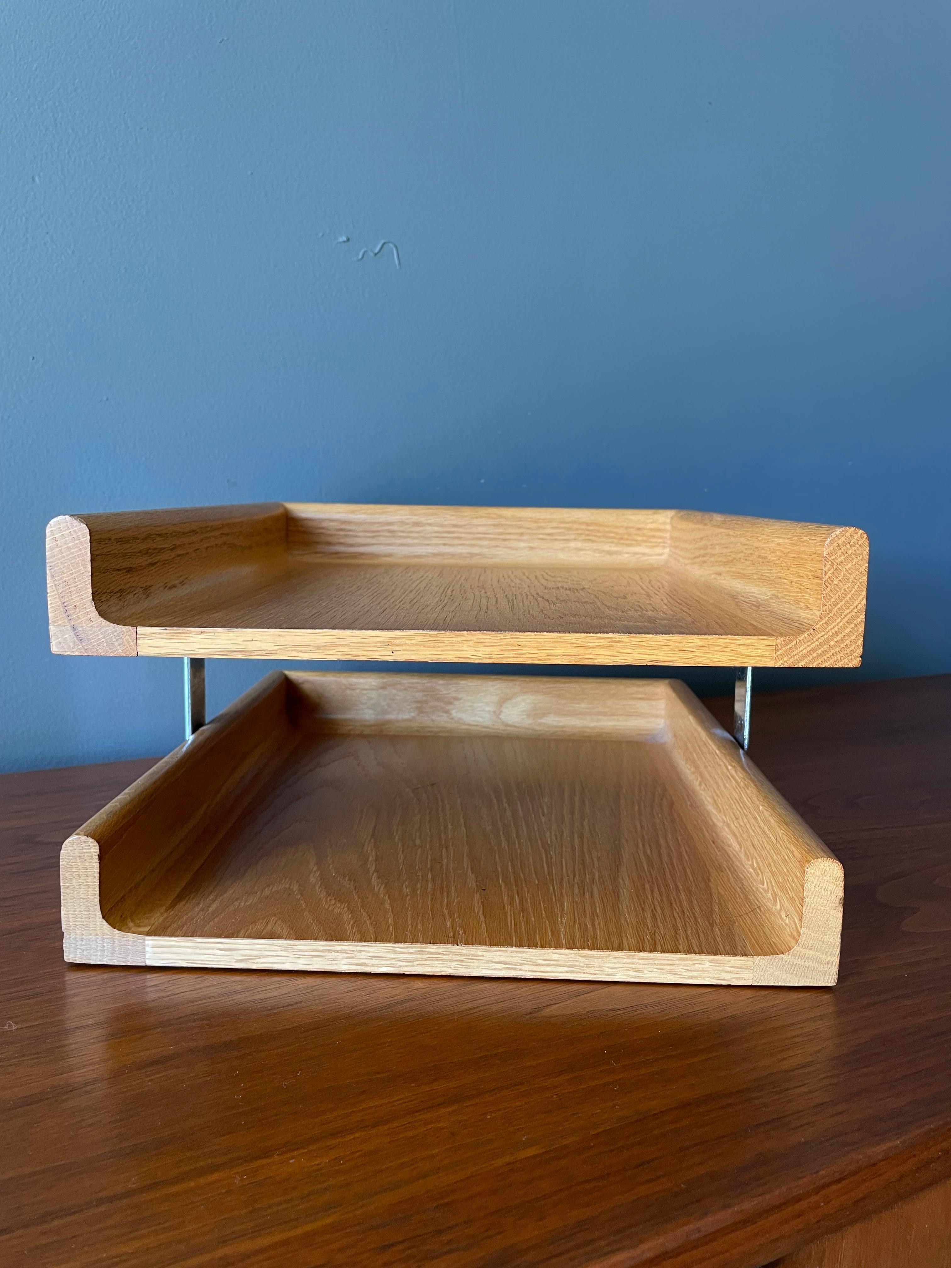 Vintage two tiered letter tray manufactured by Peter Pepper Products, circa 1970s. Sculpted oak with chrome joinery which compliment each other perfectly.