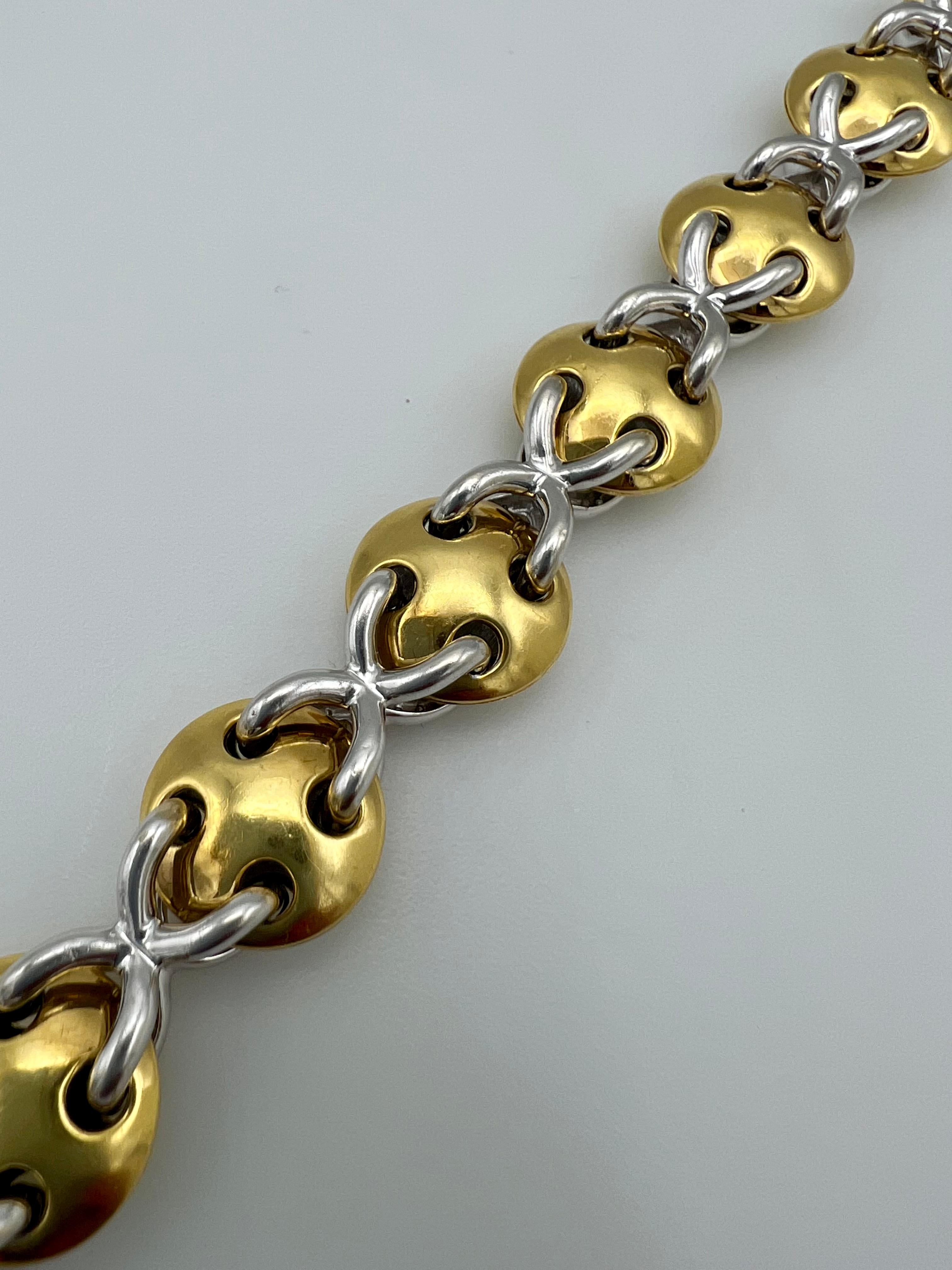 - The bracelet features “X” motif link
- 18 karat yellow and 18 karat white gold
- 1.80 carat of round brilliant cut diamonds

Hallmarks: 750
Total weight: 58.5 grams
Measurements: 7.5” long  