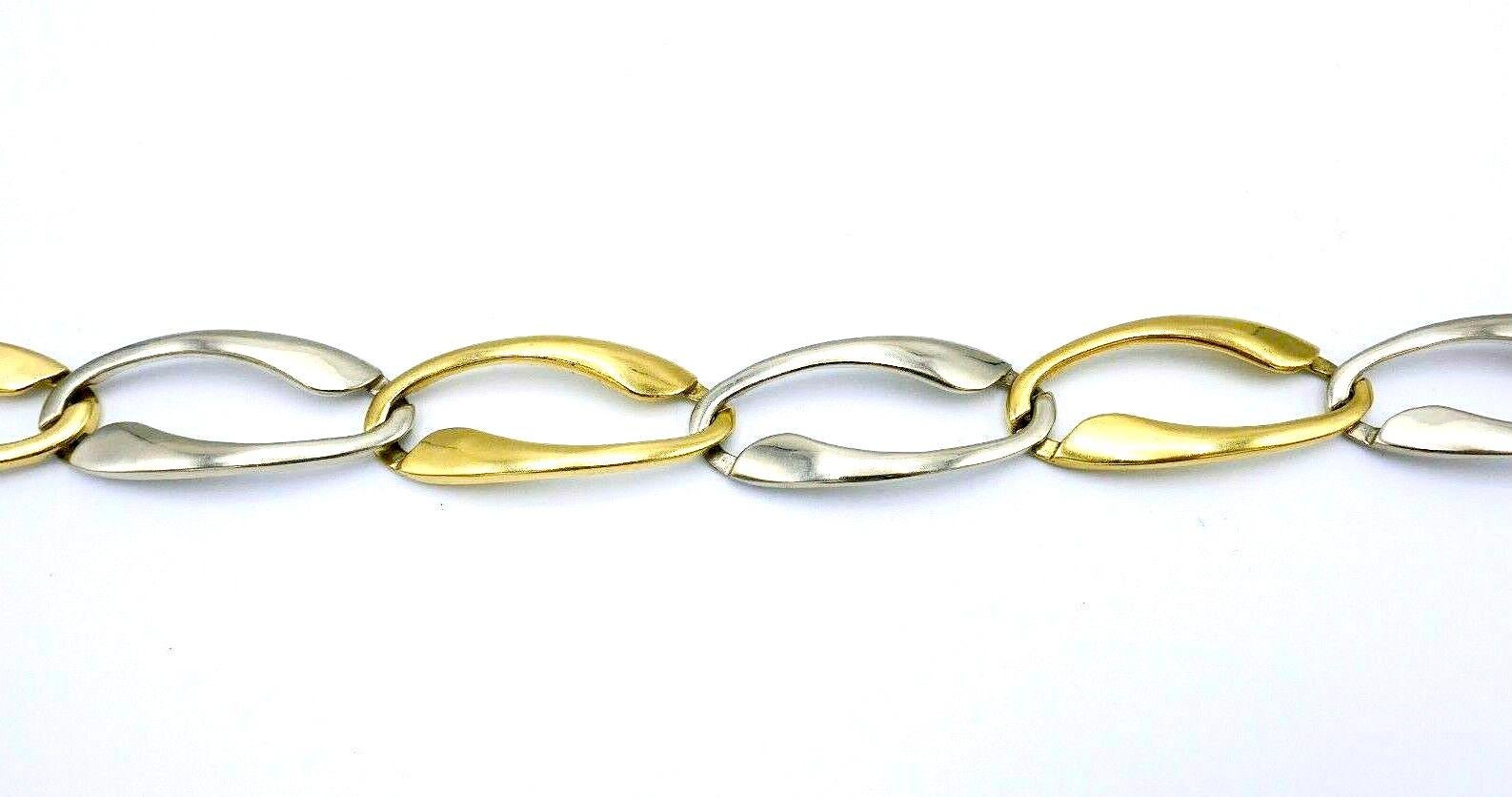 Sencilla pero hermosa pulsera de eslabones vintage de oro amarillo y blanco pulido de 18 quilates. Con sello de calidad  de oro de 18 quilates.
Medidas: 8