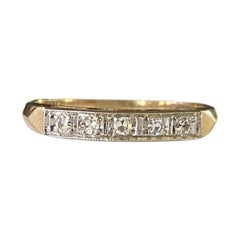 Fascia vintage con cinque pietre di diamante a due toni