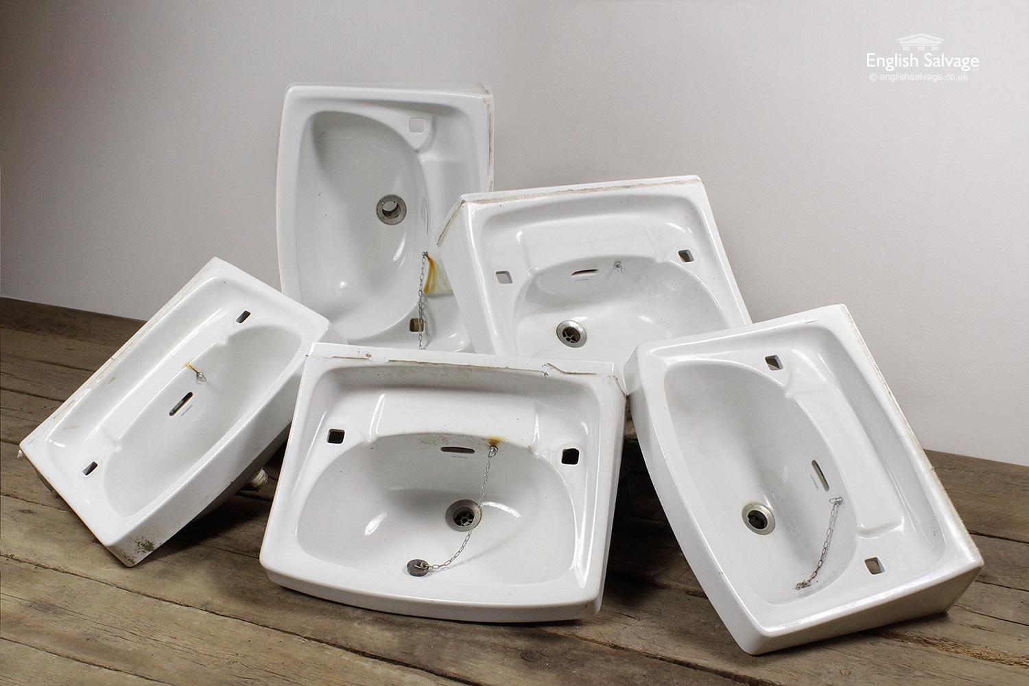 Matching vintage Twyfords wash basins or sinks. All have two tap holes, wastes and overflows. Height given of 33cm includes the waste outlet, the basin sides are 14cm high. Hairline cracks, rust marks and scuffs and old silicone present.