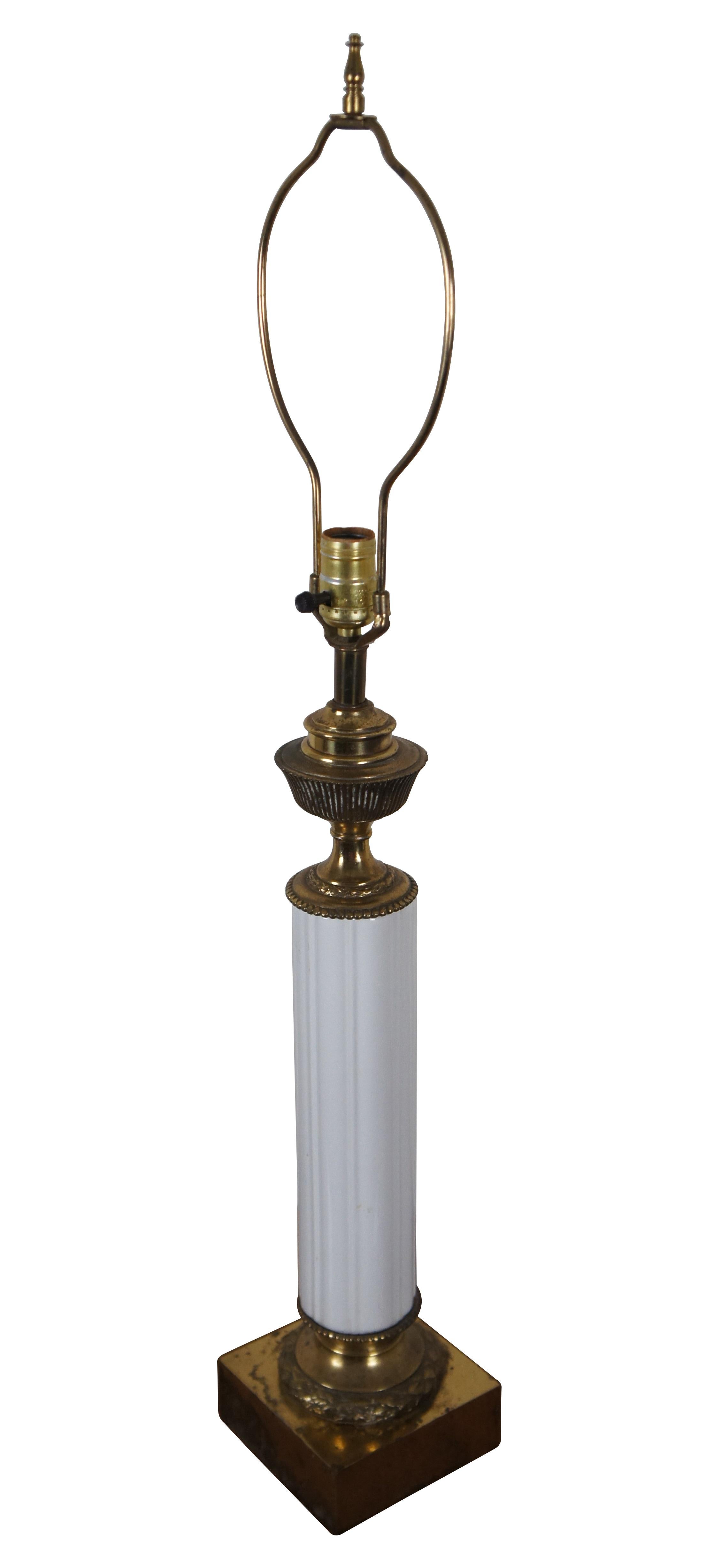 Vintage Tyndale brass and milk glass table lamp featuring Neoclassical styling.

Dimensions:
5.5