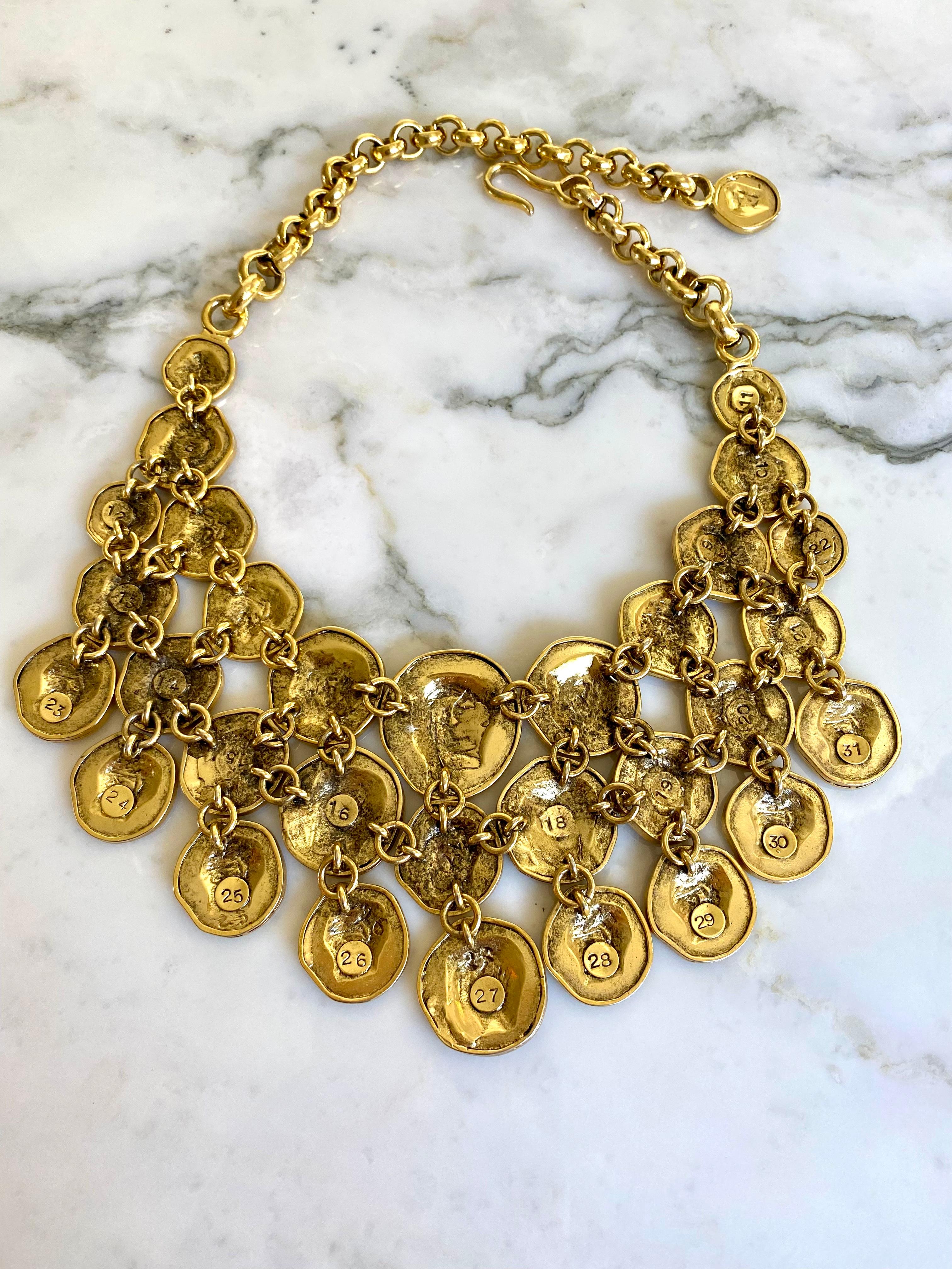 Vintage Ugo Correani Roman Medallion Gold and black pendant bib/ choker necklace.
Necklace is in excellent condition.  
(this listing only for necklace, earring is listed separately)

weight : 11.30 oz
