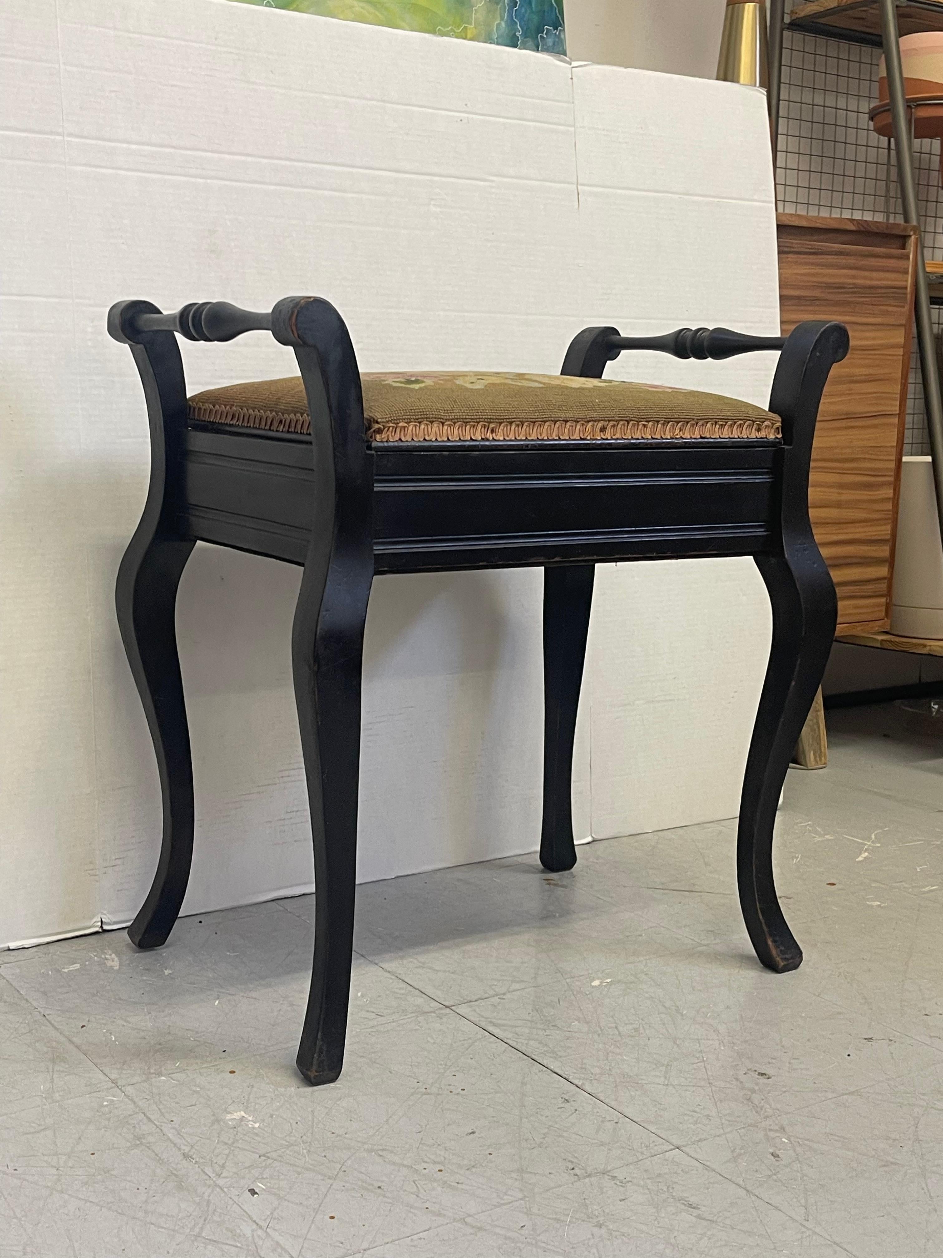 Vintage UK Imported Black Toned Wood Needlepoint Stool Upholstered Accent Bench In Good Condition For Sale In Seattle, WA
