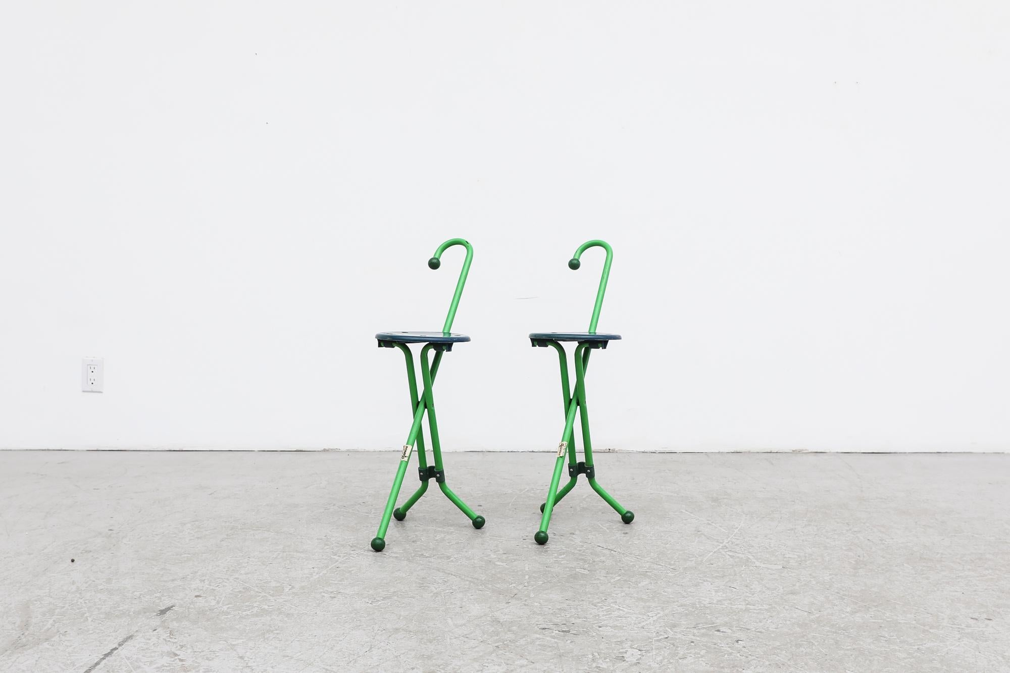 Vintage green folding cane chairs by Pompis in the style of the 'Ulisse' by Ivan Loss. These are called 