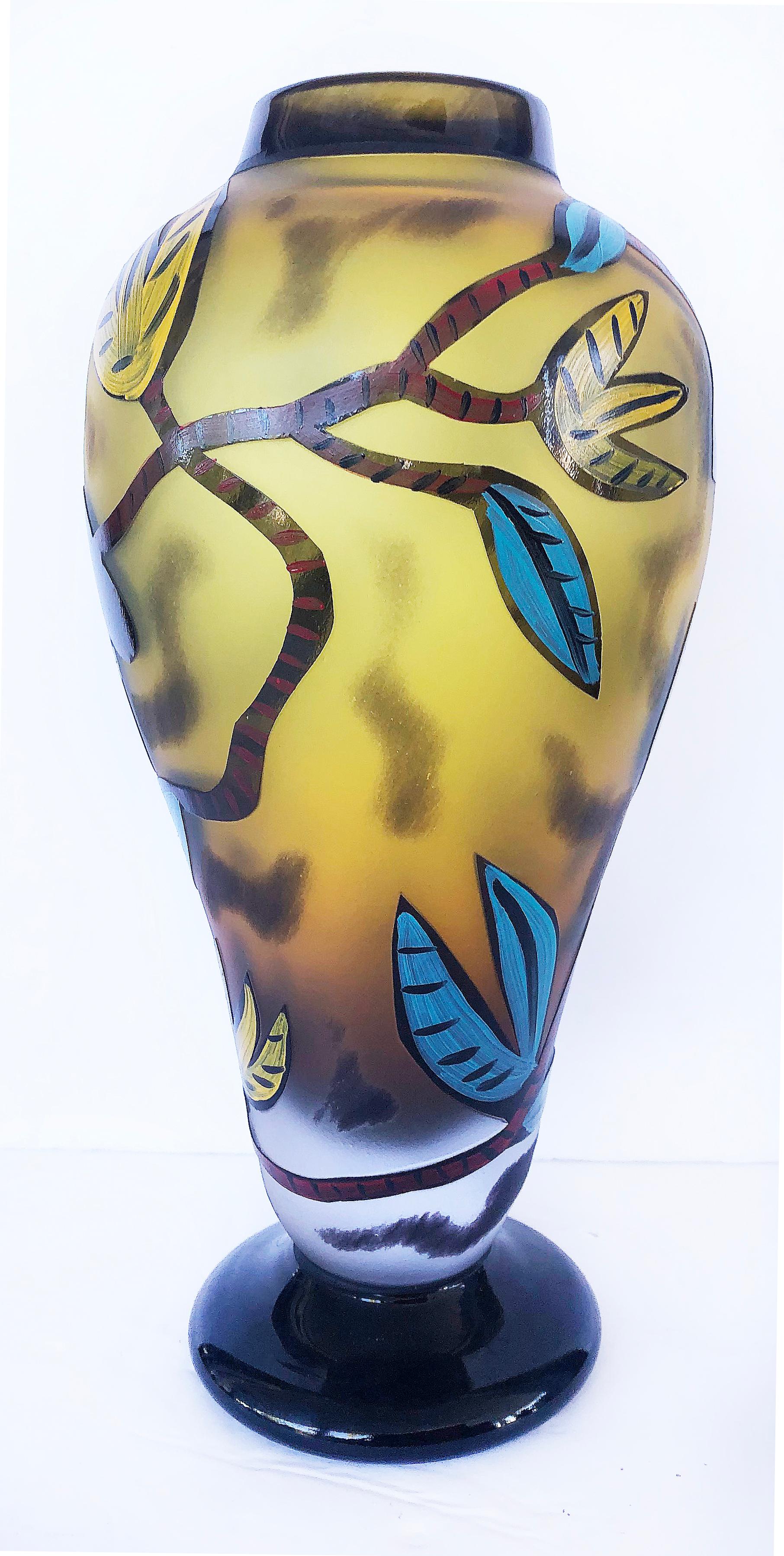 Vintage Ulrica Hydman-Vallien Kosta Boda art glass vase

Offered for sale is a very unusual Ulrica Hydman-Vallien Kosta Boda art glass vase. The form of the vase, as well as the painting, are really quite striking. The vase is signed and numbered