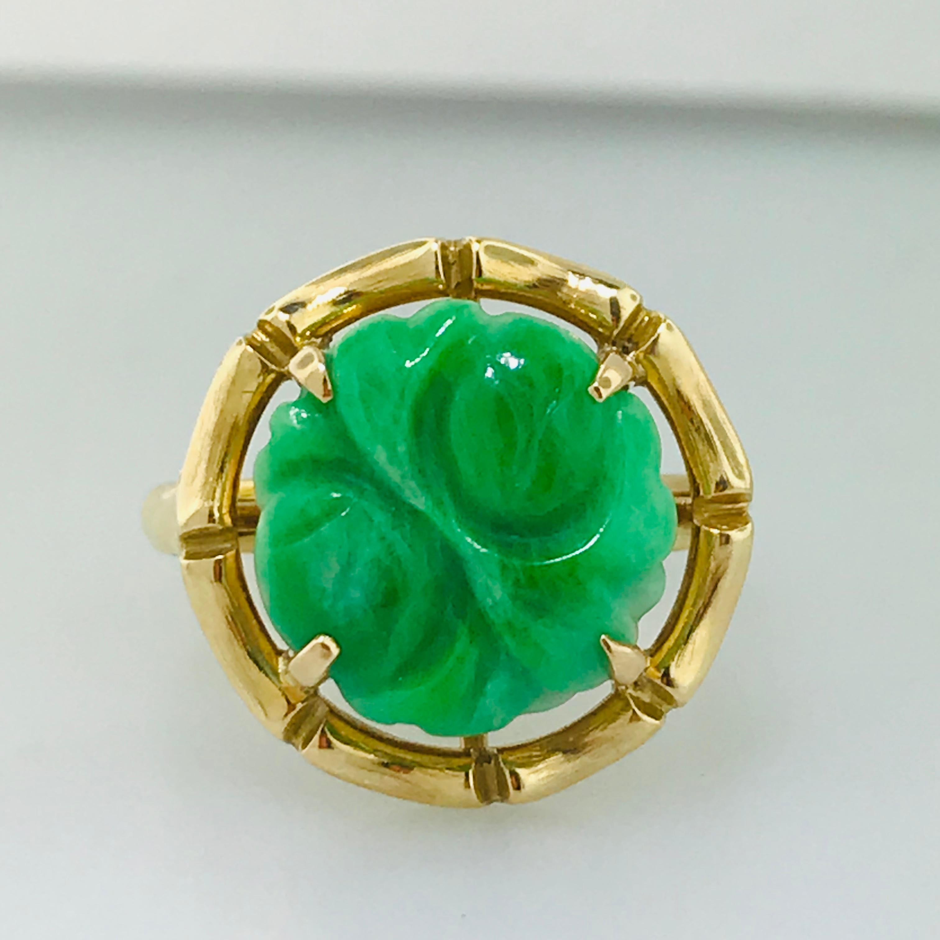 A special vintage jadeite jade piece! Jadeite Jade is the rarest of all jade and the most valuable!

This ring has a hand carved jade piece set in four pointed prongs in a rich 14k yellow gold. The yellow gold compliments the deep green jade color,