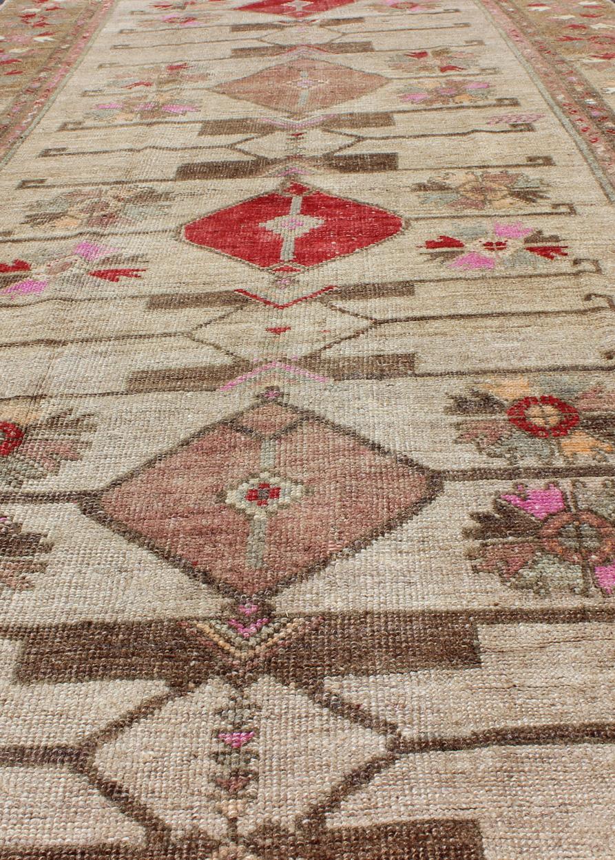 Mid-20th Century Vintage Unique Oushak Runner with Tribal Designs and Geometric Motifs For Sale