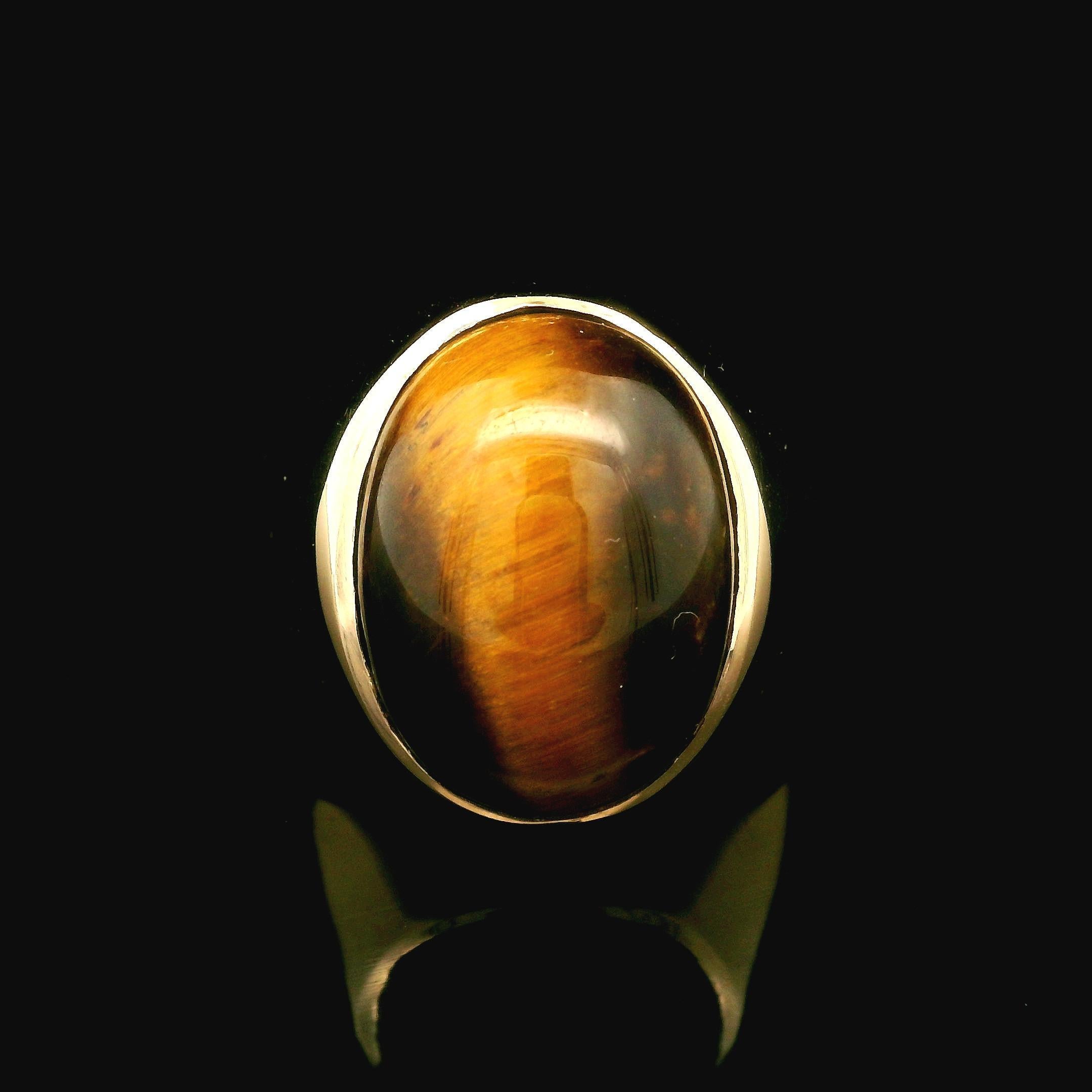 –Stone(s)–
(1) Natural Genuine Tiger's Eye - Oval Cabochon - Bezel Set - Coffee Brown Color - 15.88 x 11.89mm (approx.)

Material: 10k Yellow Gold
Weight: 8.67 Grams
Ring Size: 7.5 ( fitted on finger, please contact us prior to purchase for sizing