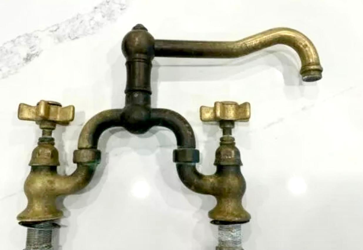 Vintage unlaquered brass Italian country bridge faucet by Rohl, living finish. Made in Italy. Bridge 2-hole mixer, classical Tuscan style, lovely patina.