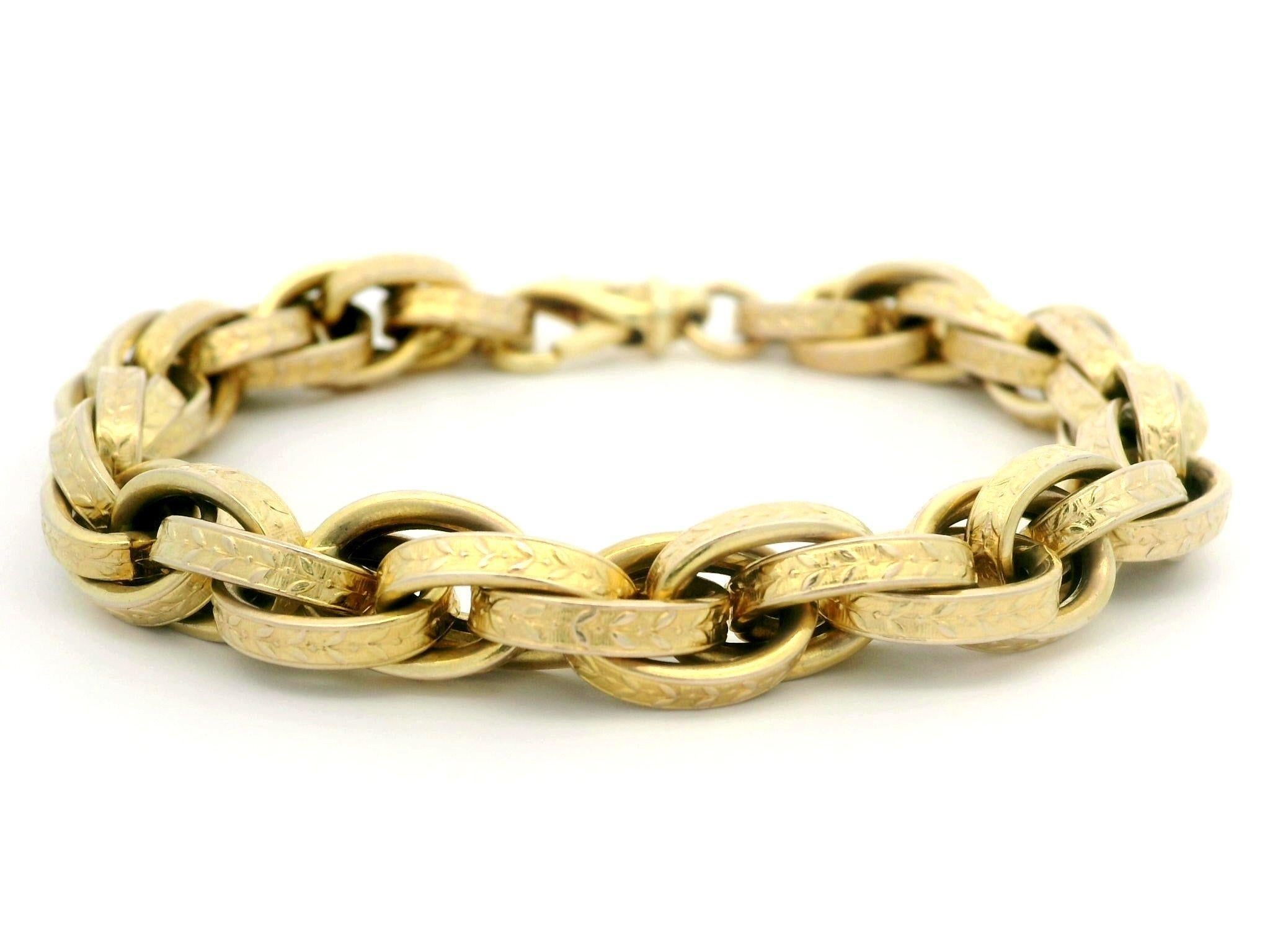 Material: Solid 14k Yellow Gold
Weight: 17.58 Grams
Chain Type: Interlocking Oval Links
Chain Length: Measures 7.5 Inches Next to a Ruler. Will comfortably fit up to 6.5” wrist (fitted on wrist)
Link Width: 8.8mm (0.34