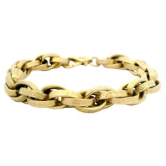 Vintage UNOARRE 14k Gold Textured Floral Pattern Interlocking Link Bracelet