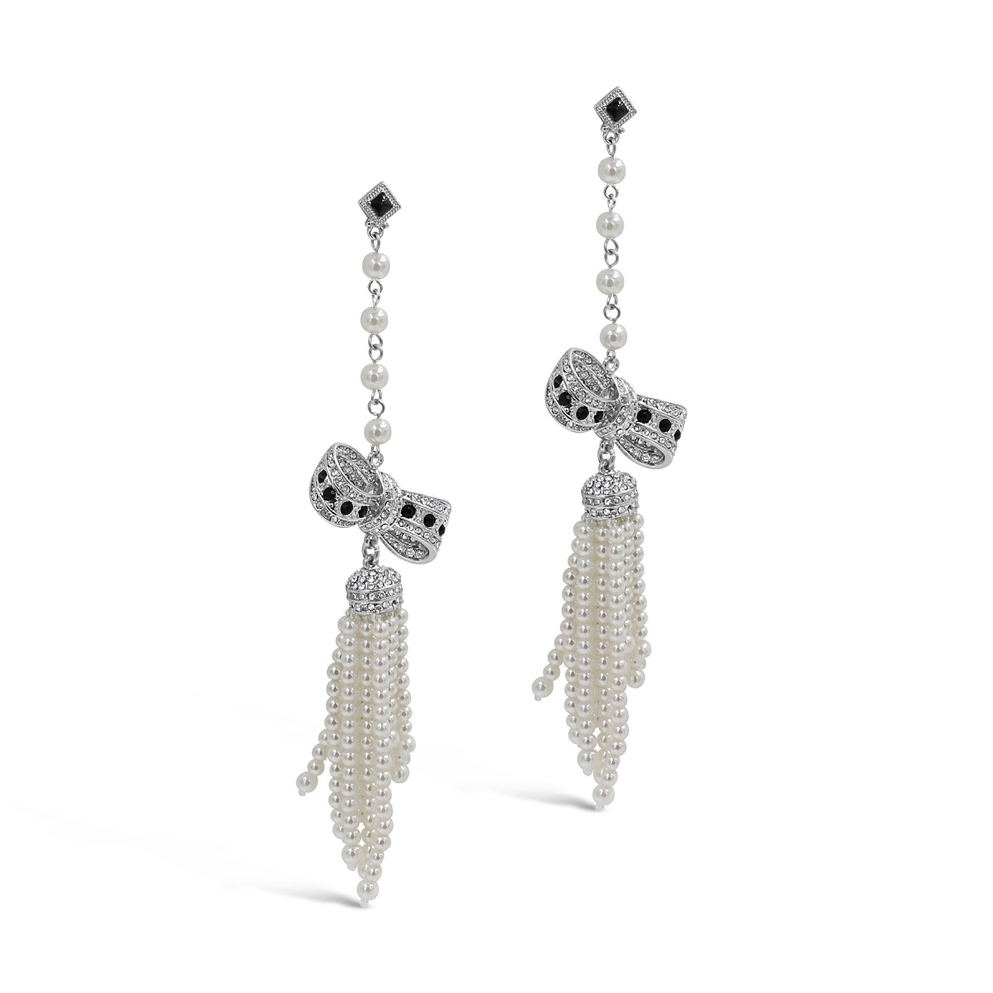 Vintage Unsigned Long Dangling Pearl and Rhinestone Bow Earring.  6