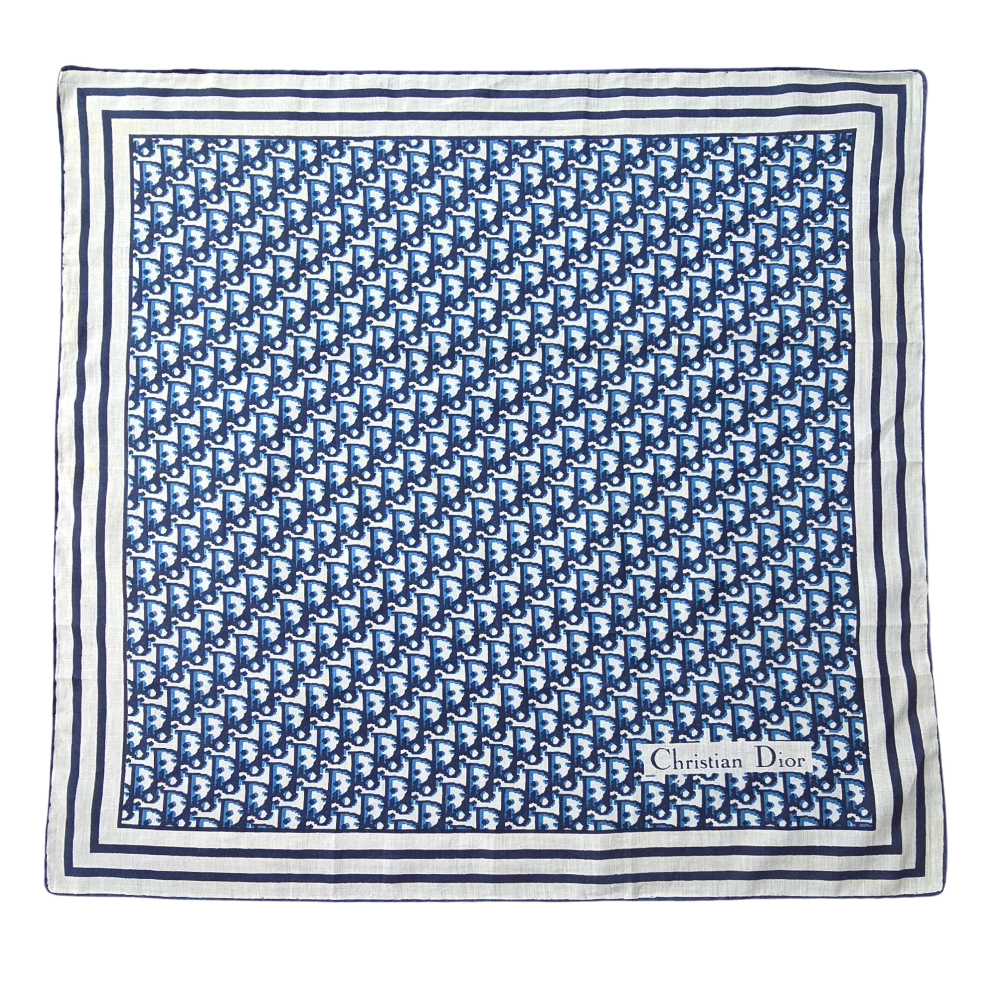 Vintage Christian Dior Scarf with the iconic Dior monogram.  Blue and white striped border. This is an unused item and comes with the original Christian Dior packaging.  This comes from my mother's own personal collection and therefore you are