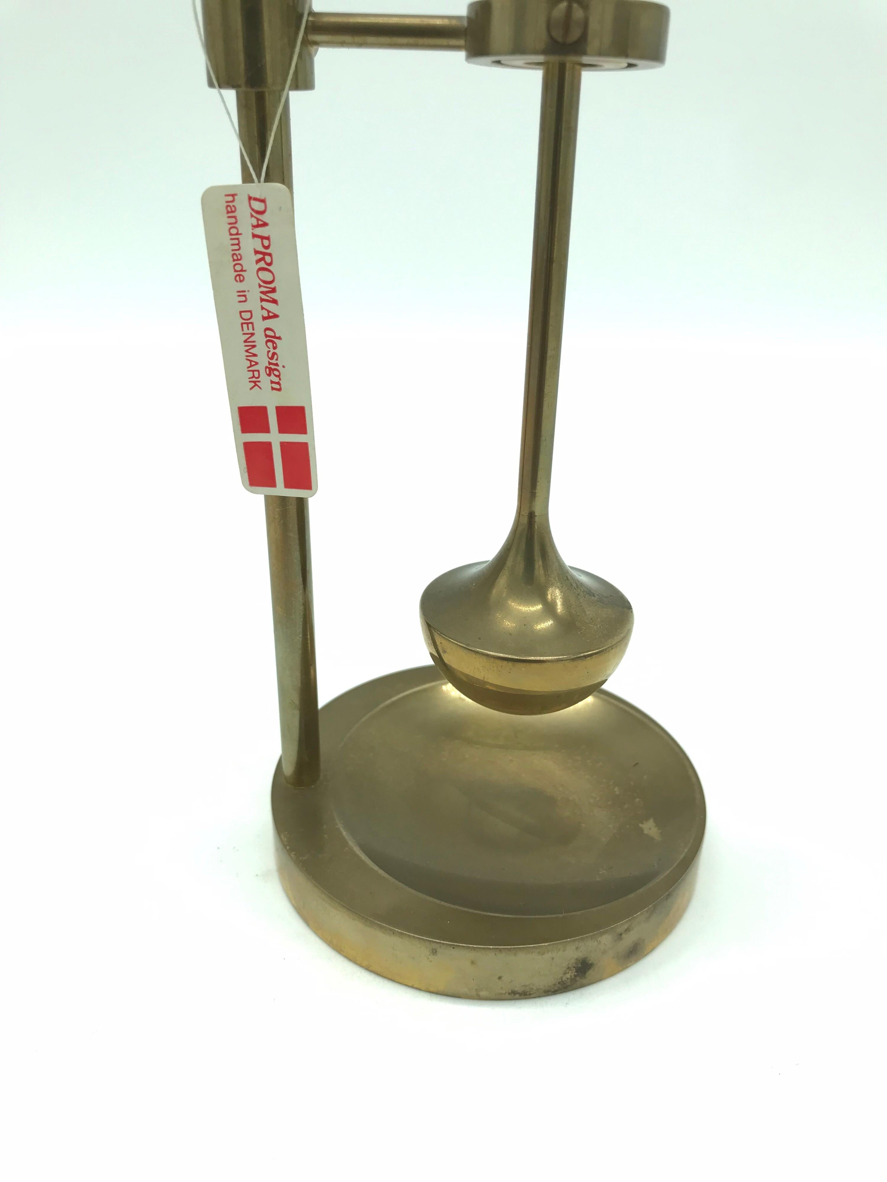 Vintage unused midcentury oil lamp by Ilse Ammonsen for Daproma Denmark 
This oil lamp has never been used and still has the original labels 
It has only received a wipe down to maintain patina to the surface of the brass 
If so desired it could