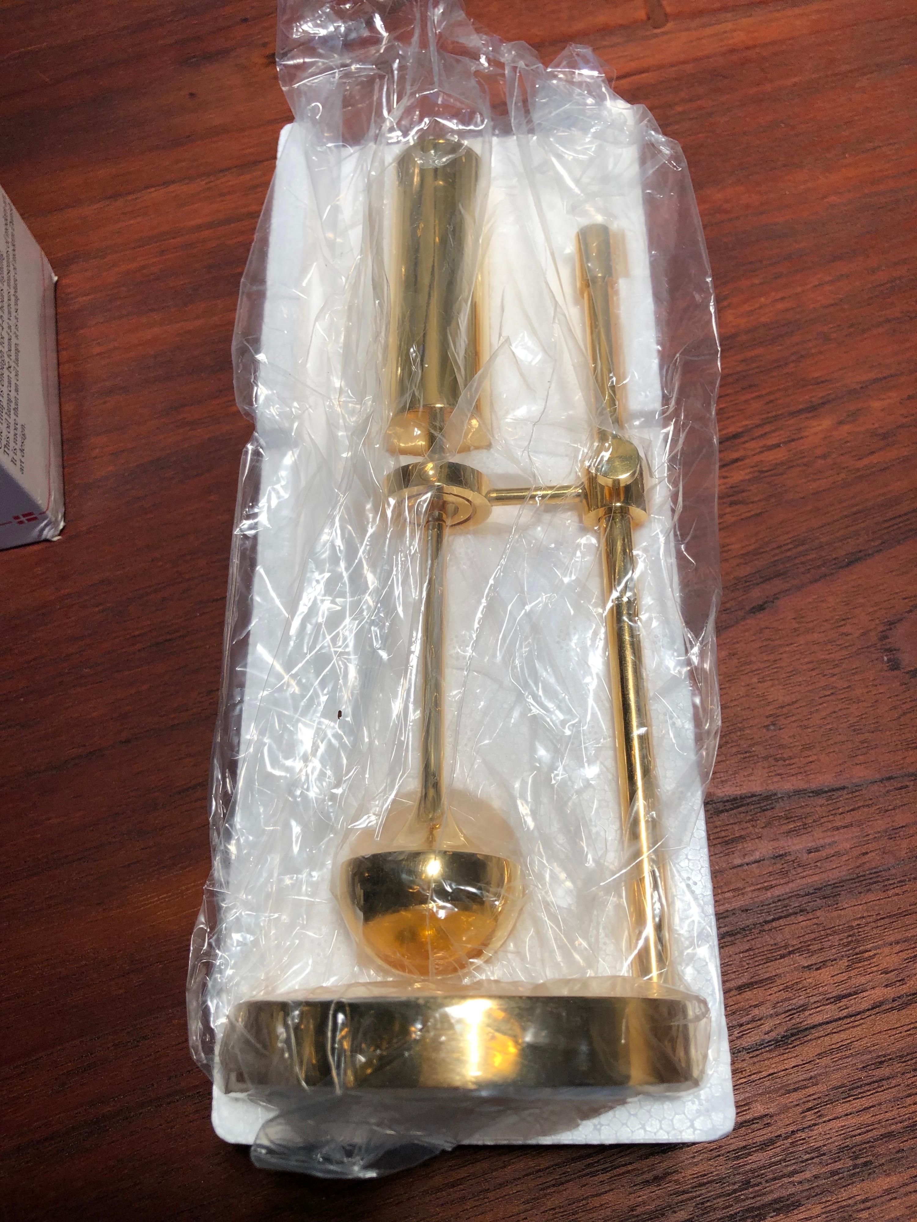 Vintage unused midcentury oil lamp by Ilse Ammonsen for Daproma Denmark
In 24-carat gold plate and in the original box and packing which is rare.
An extra wick will be included.
Runs on normal lamp oil. 



  