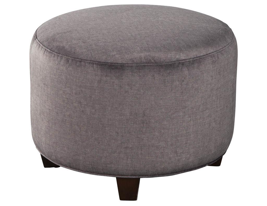 Vintage Upholstered Mid-Century Modern ottoman stool. Newly restored in dark grey fabric and sleek walnut feet.

Price includes complimentary curb side delivery to the continental USA.