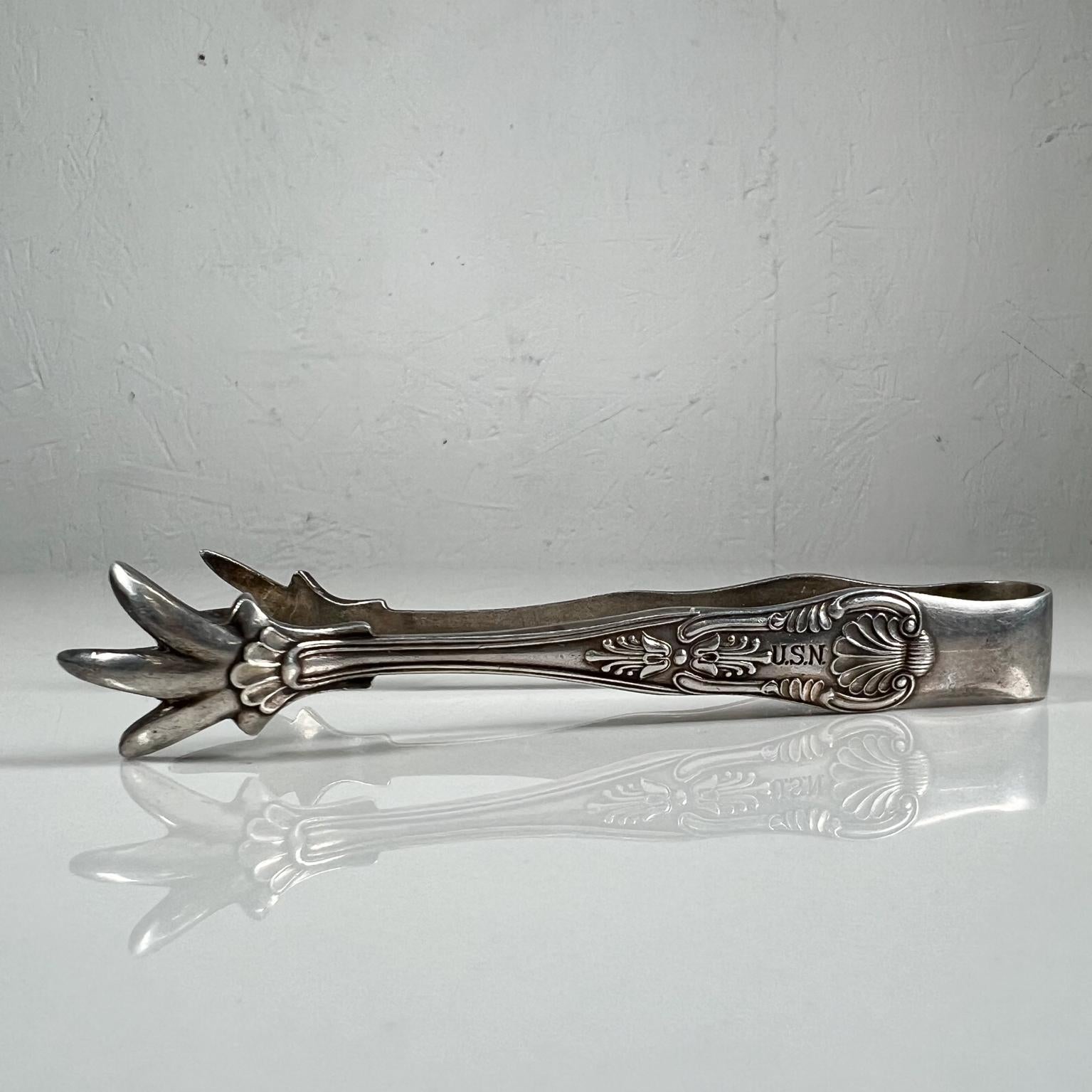 antique silver claw