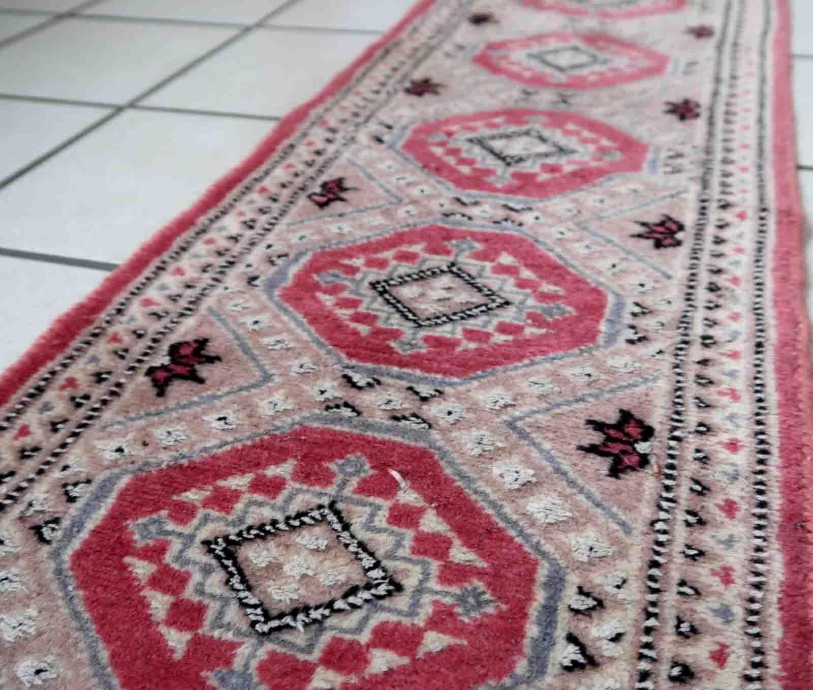 Vintage Uzbek Bukhara mat in light shades. The rug is from the end of 20th century made in wool with silk highlights. The rug is in original good condition.

-condition: original good,

-circa: 1970s,

-size: 1' x 3.1' (32cm x 97cm),
​
-material: