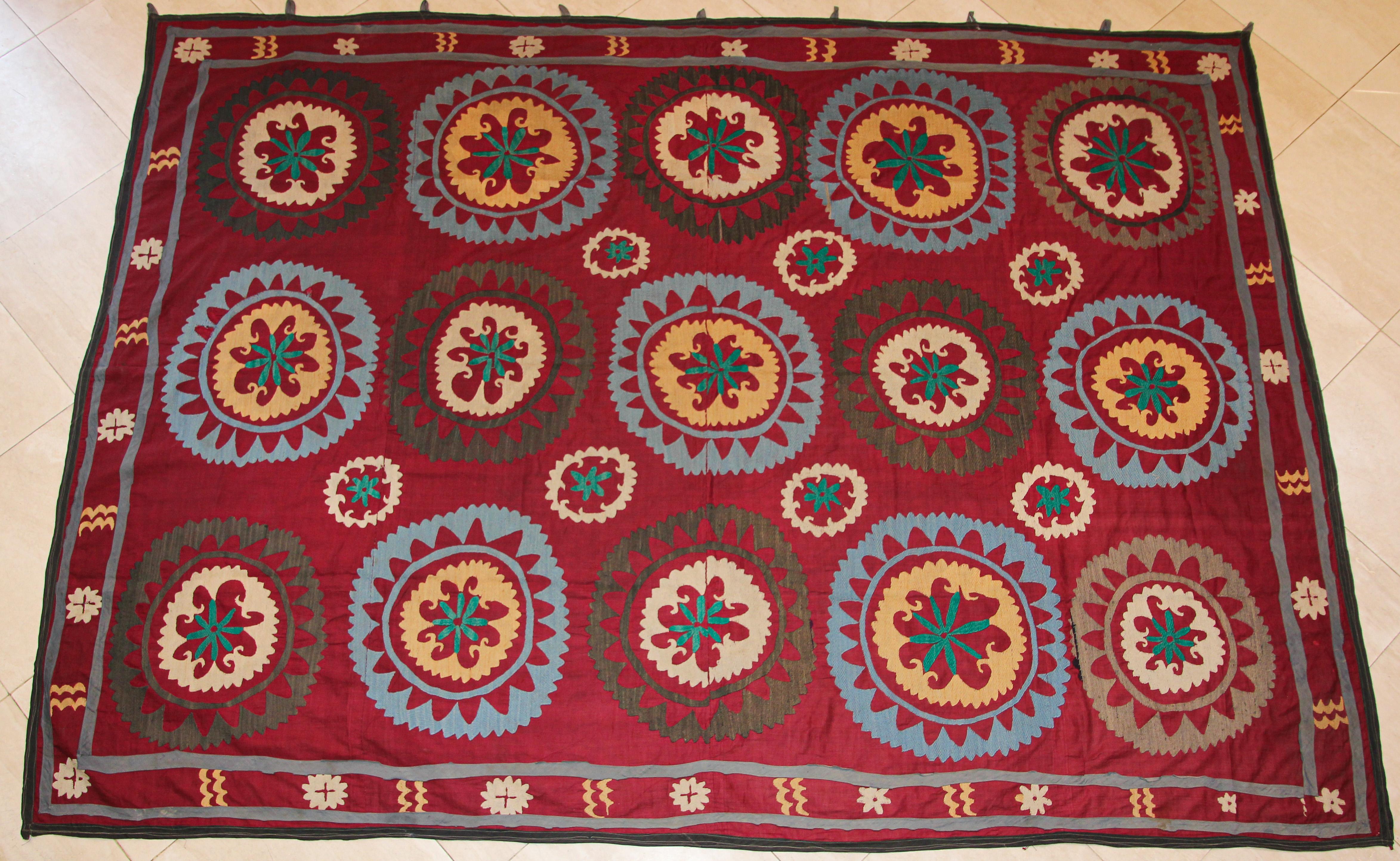 Large vintage Suzani Uzbek Samarkand textile, Suzani means needlework and these embroideries are some of the most characteristic forms of textile art from Central Asia.
A beautiful old Turkish embroidered Suzani textile from Uzbekistan. 
The