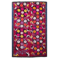 Antique Uzbek Suzani Silk Embroidery in Red, Ivory, Blue, Yellow, Black, Purple