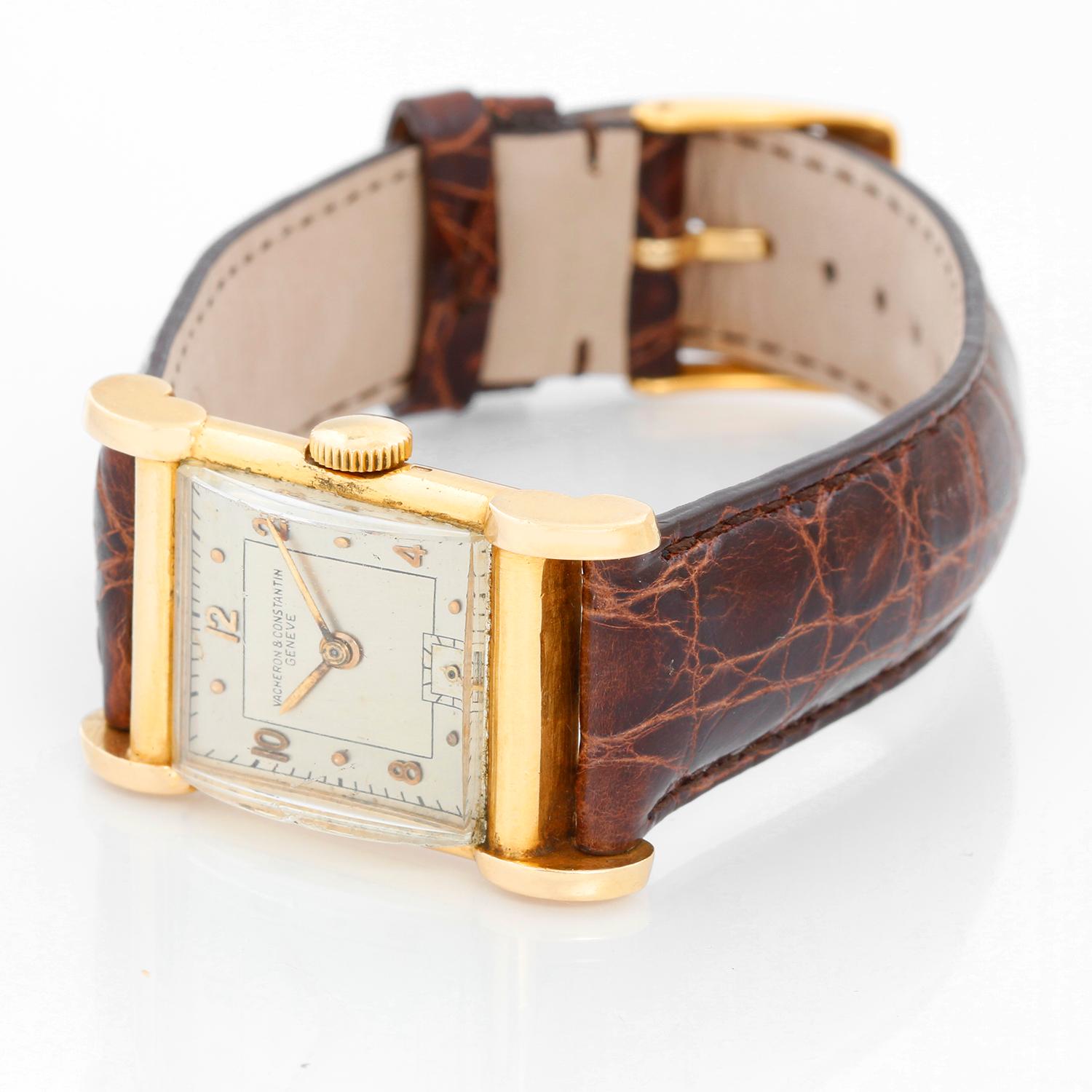 Vintage Vacheron Constantin 18k Gold Art Deco Men's Watch - Manual winding. 18k yellow gold case (22mm diameter). Silver dial with gold Arabic numerals. Brown leather strap band. Vintage, pre-owned, with custom box.