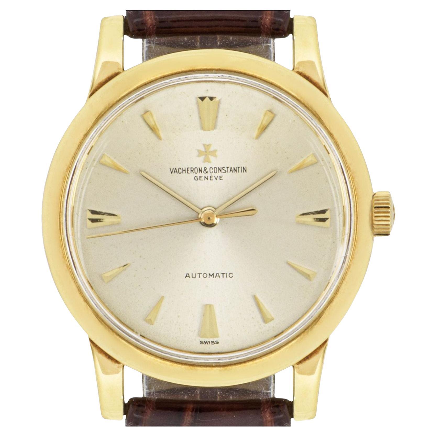 A vintage mens 35mm wristwatch in yellow gold by Vacheron Constantin. Featuring a silver dial with applied hour markers and a fixed yellow gold bezel. Fitted with a plastic glass, a self-winding automatic movement and a generic leather strap set