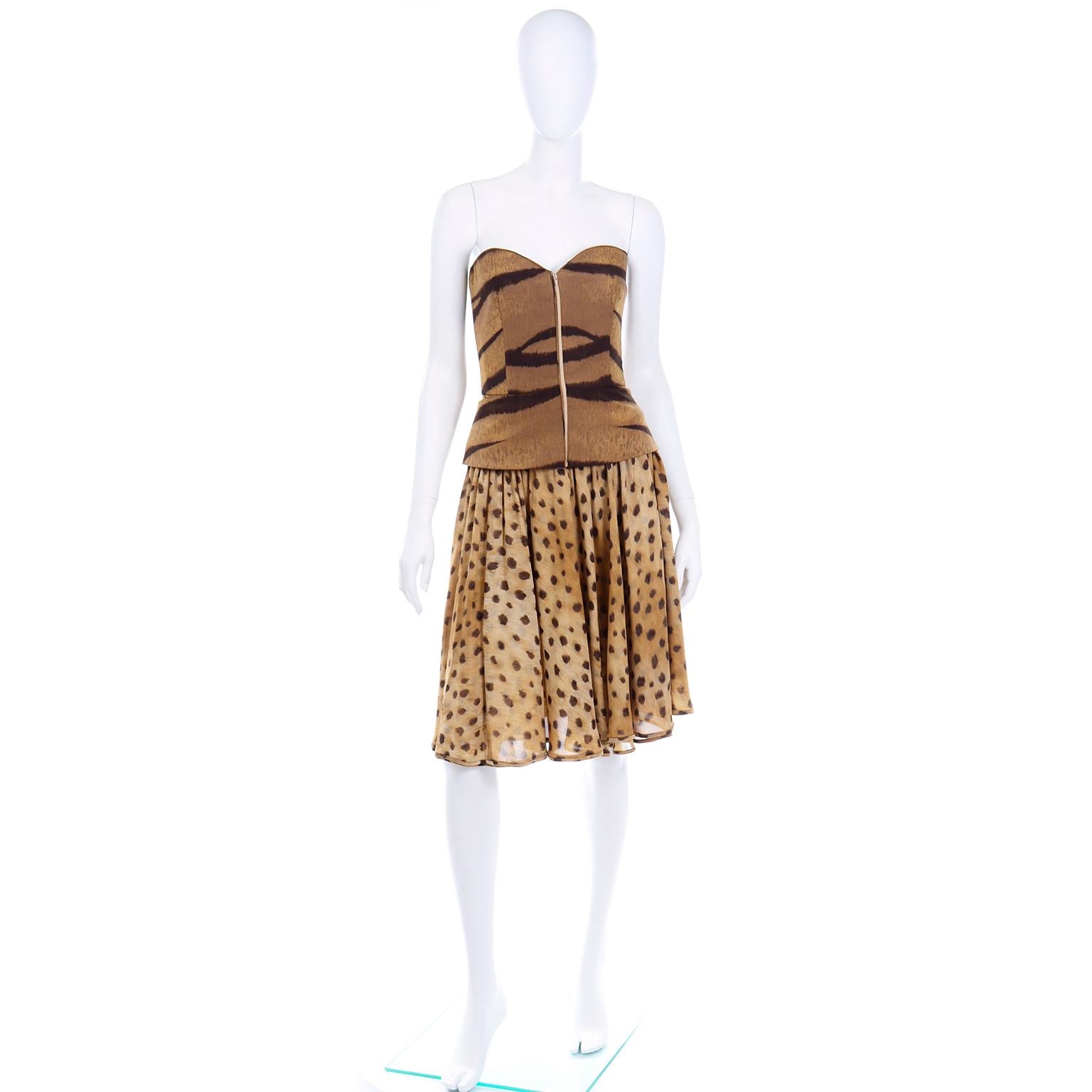 This vintage Valentino bustier skirt set is really fun with mix-match animal prints. The top is more of a brown zebra print and the skirt is more of a cheetah print. Wear the pieces together or break them up and you have wo fabulous separates! The