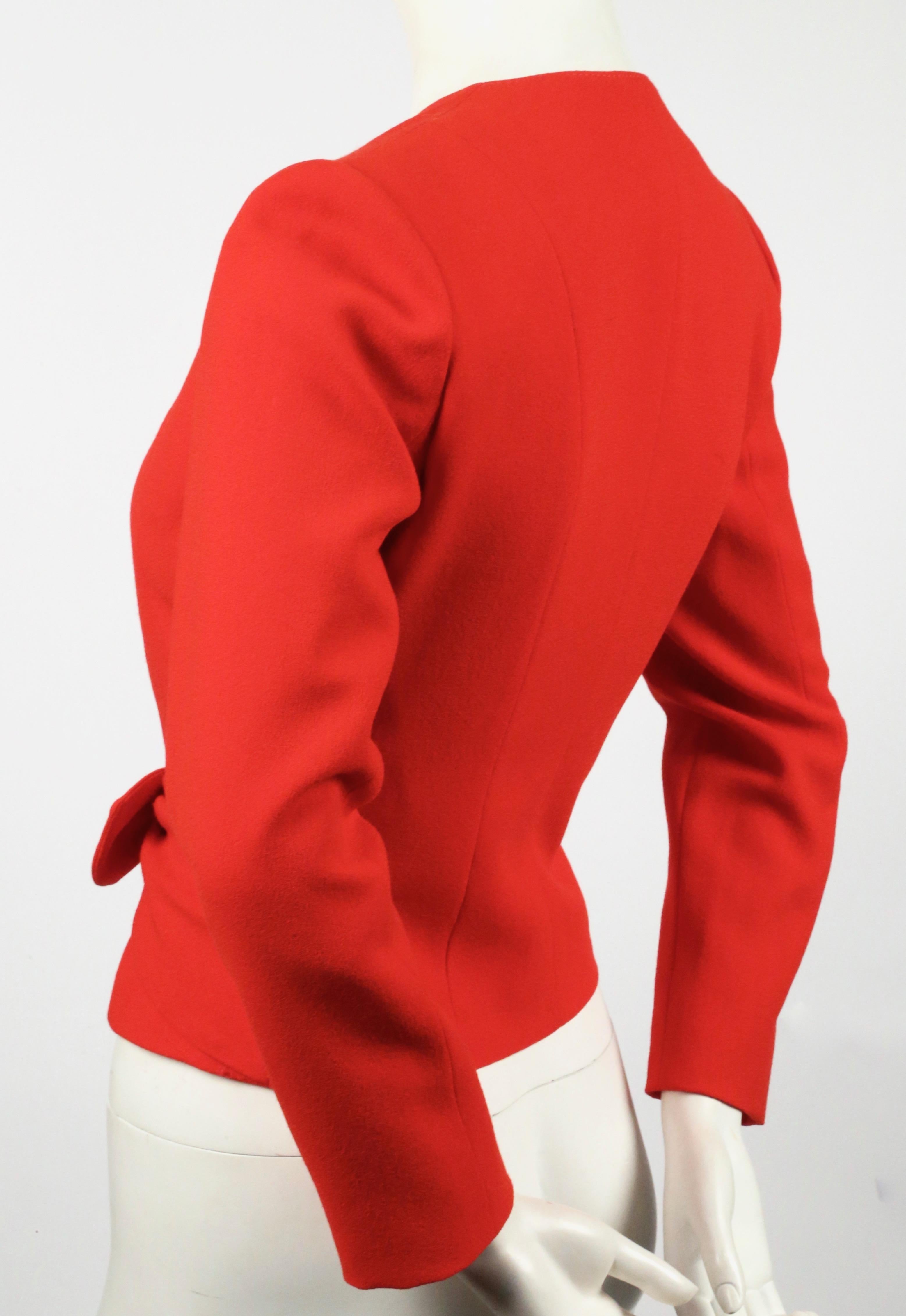 Fitted red, wool jacket with tie accented sash half-belt designed by Valentino dating to the late 1990's, early 2000's. U.S. size 6. Approximate measurements: 15