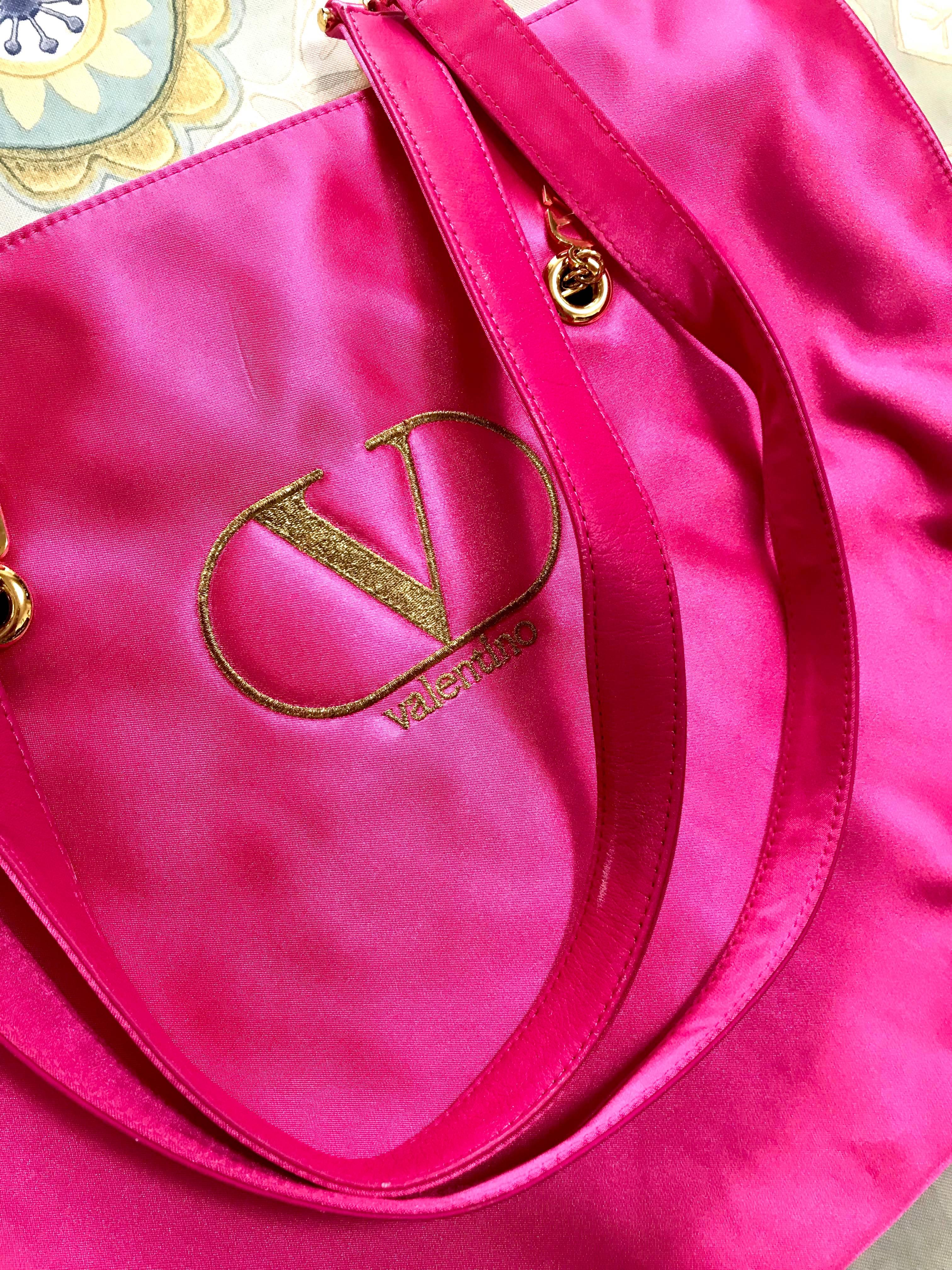 purse brand with v logo