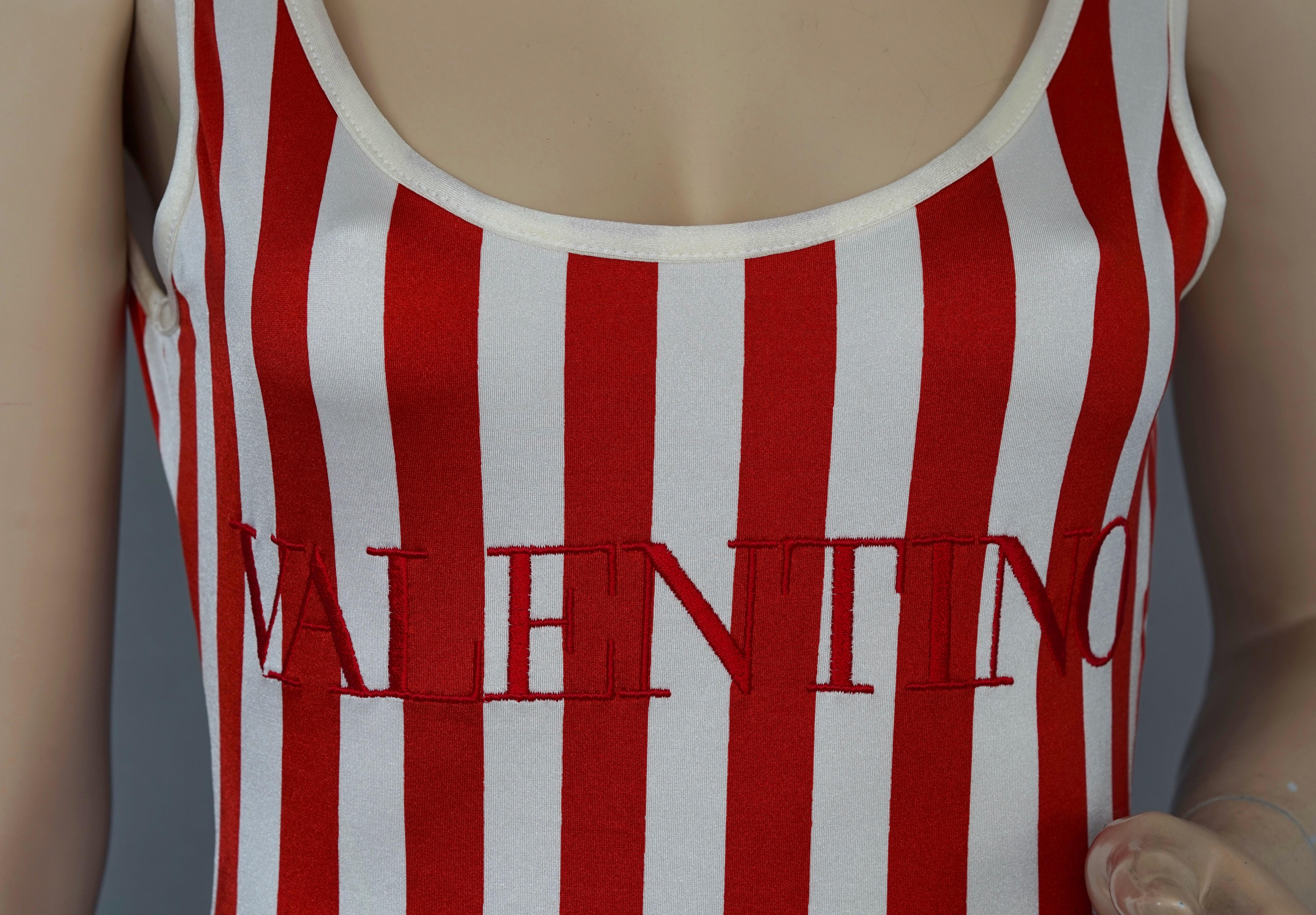 Vintage VALENTINO Logo Stripe  Swimsuit 

Measurements taken laid flat, please double bust, waist and hips:
Shoulder: 10.82 inches (27.5 cm) without stretching
Bust: 13.77 inches (35 cm) without stretching
Waist: 11.41 inches (29 cm) without