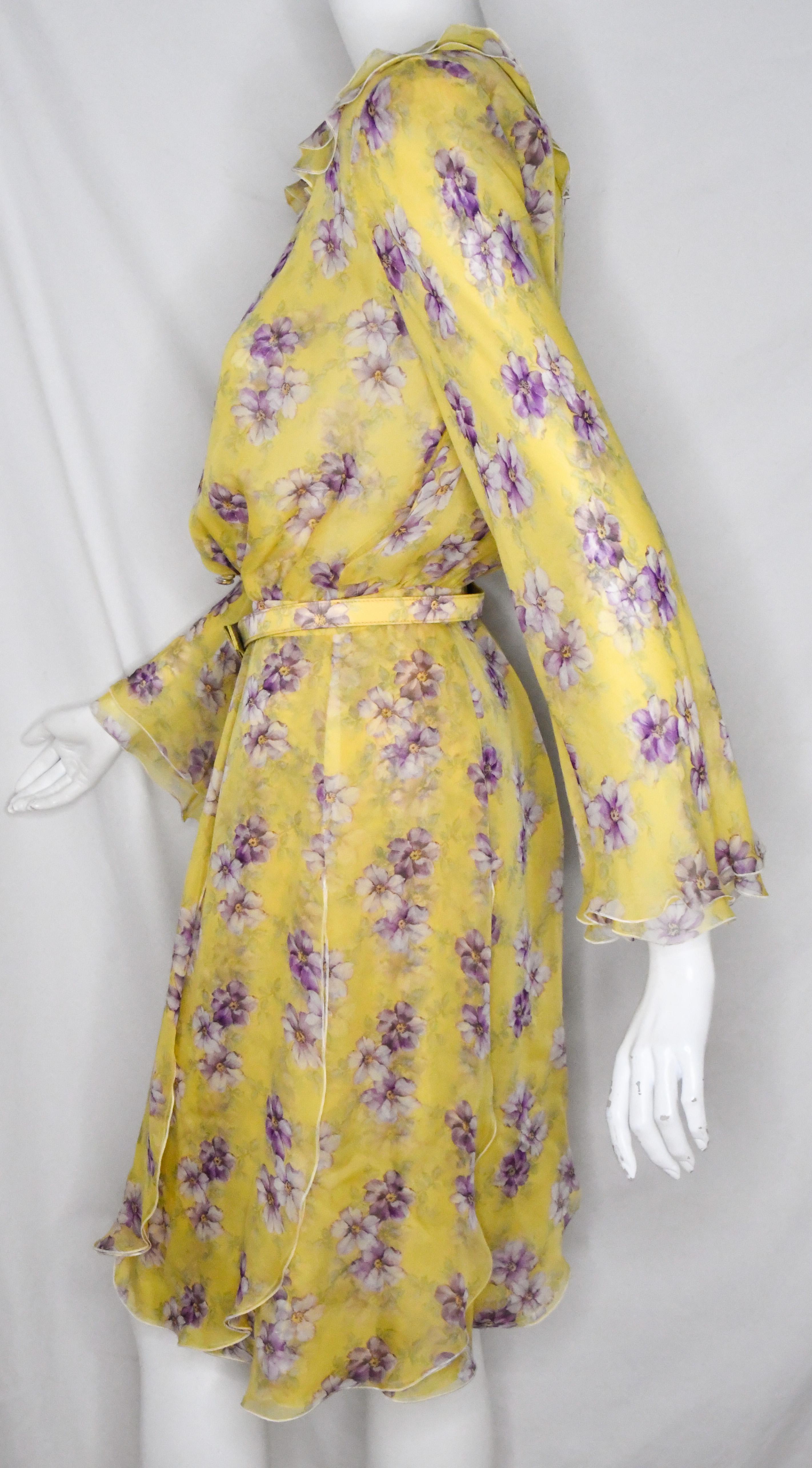This dress exemplifies the couture techniques that made Valentino Garavani a favorite of royals, celebrities, and socialites for over 50 years.  Effortlessly feminine dress features the most exquisite silk in a glorious shade of sunburst yellow. 