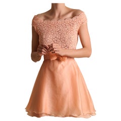 Valentino vintage senza maniche in pizzo rosa pesca babydoll svasato mini abito da cocktail