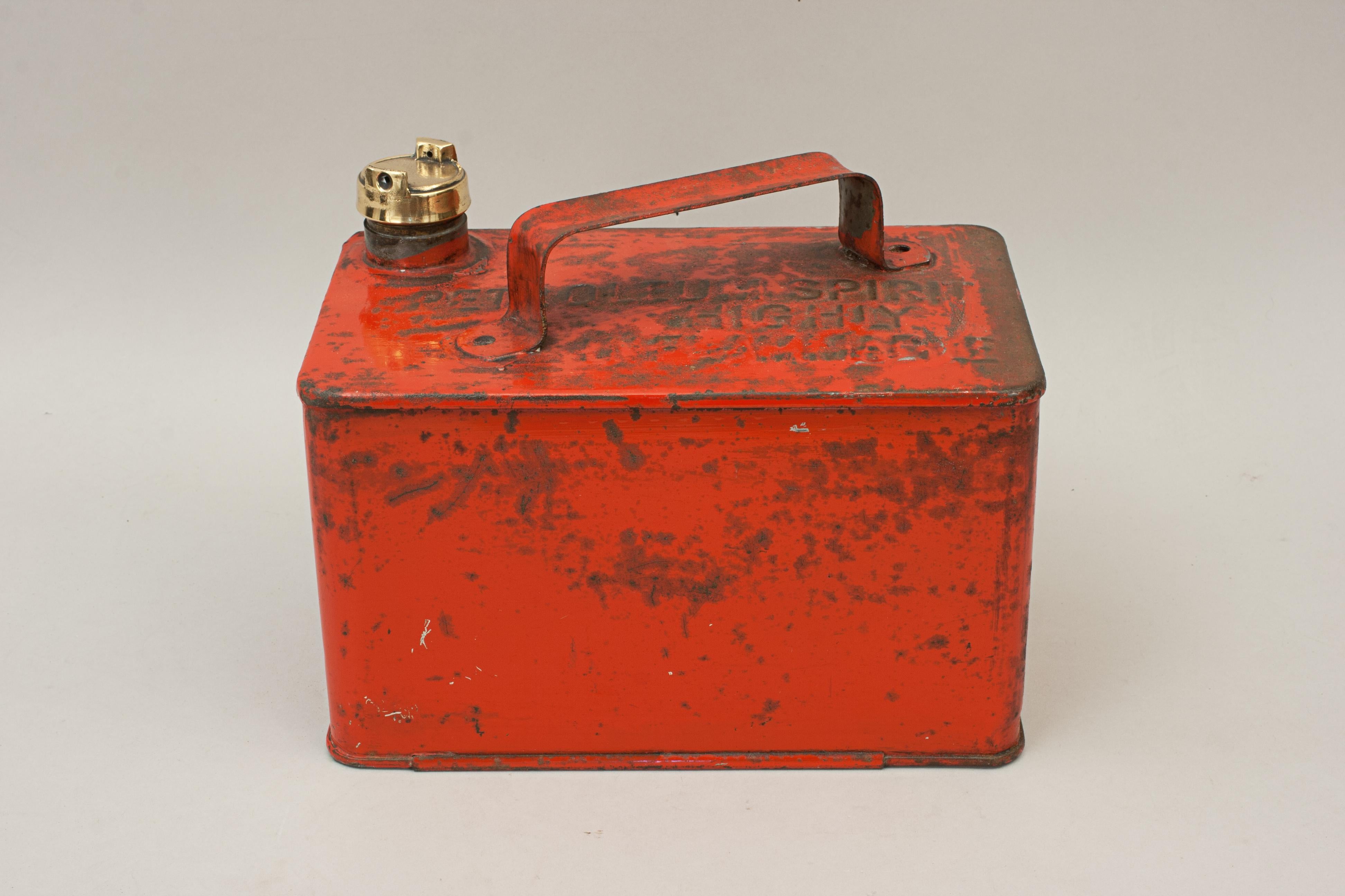 Vintage valor red petroleum spirit petrol can.
An original petroleum spirit petrol can complete with original brass screw cap. The gasoline can has most of the original red paint and embossed on the top are the words 'Petroleum Spirit Highly