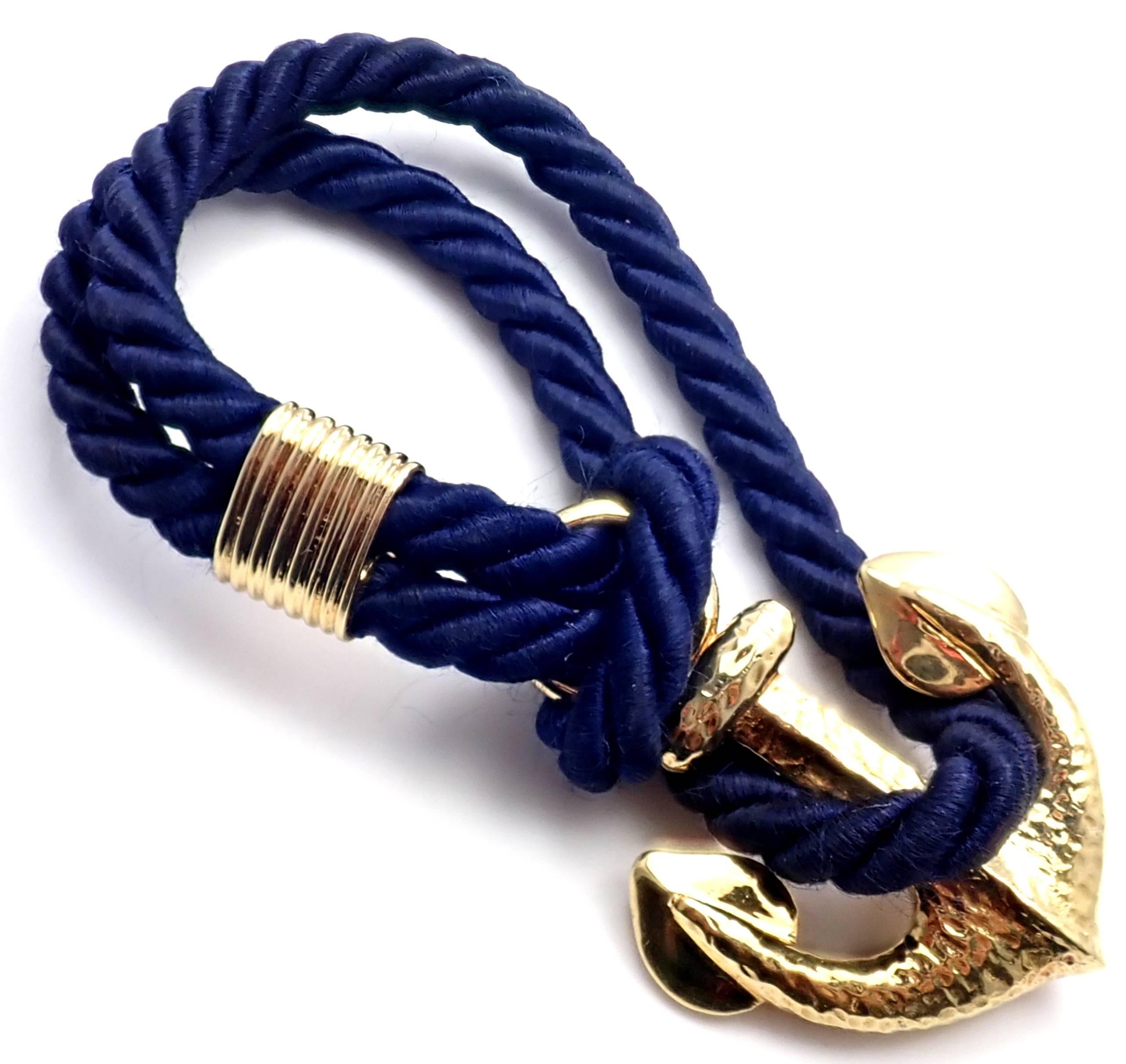 Vintage 18k Yellow Gold Anchor Navy Silk Bracelet by Van Cleef & Arpels.
Details:
Length: 6.25