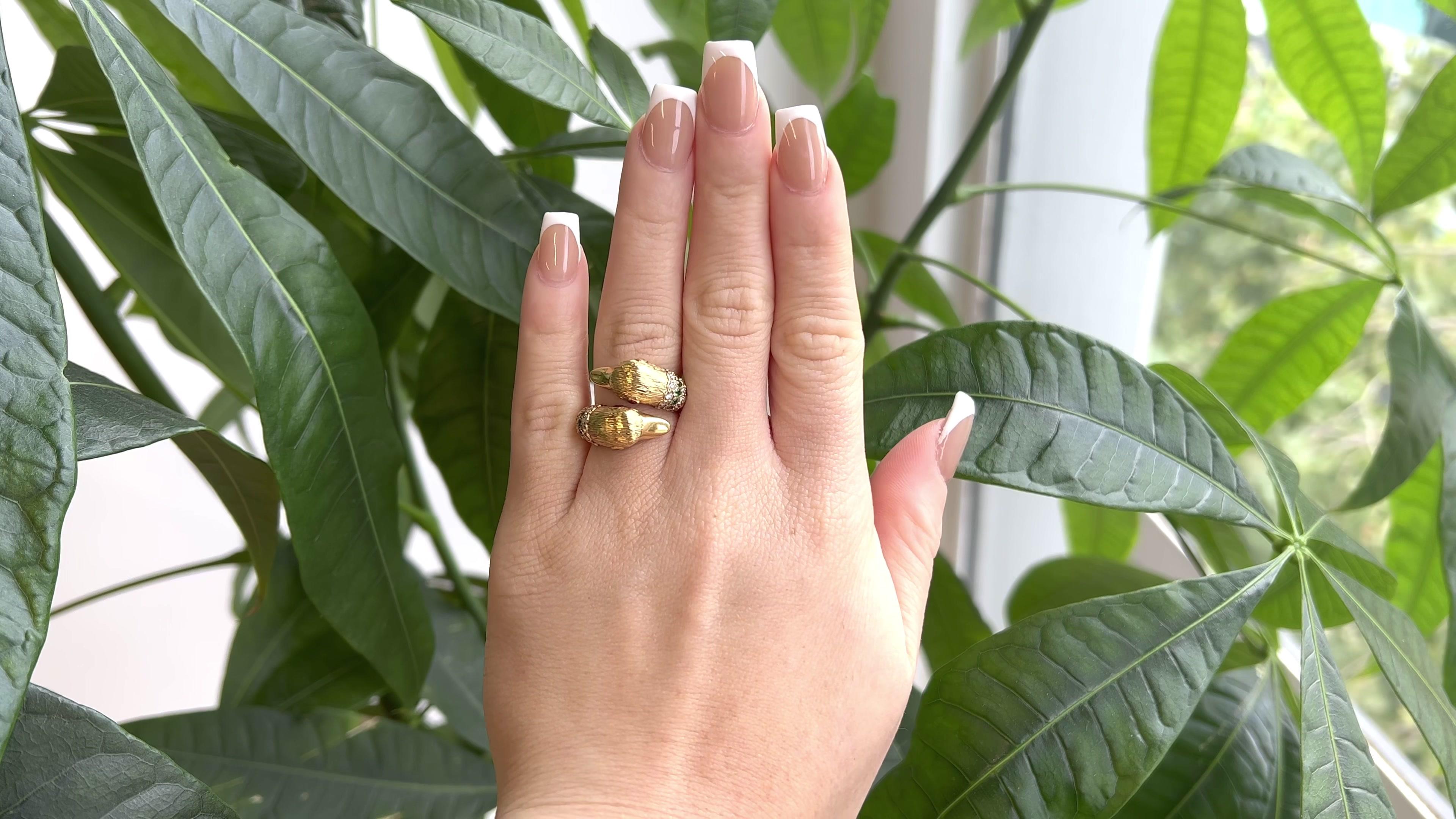 One Vintage Van Cleef and Arpels Diamond Emerald Ruby 18 Karat Gold Twin Duck Ring. Featuring 28 round brilliant cut diamonds with a total weight of approximately 0.40 carat, graded D-E color, VVS clarity. Accented by 12 round emeralds with a total