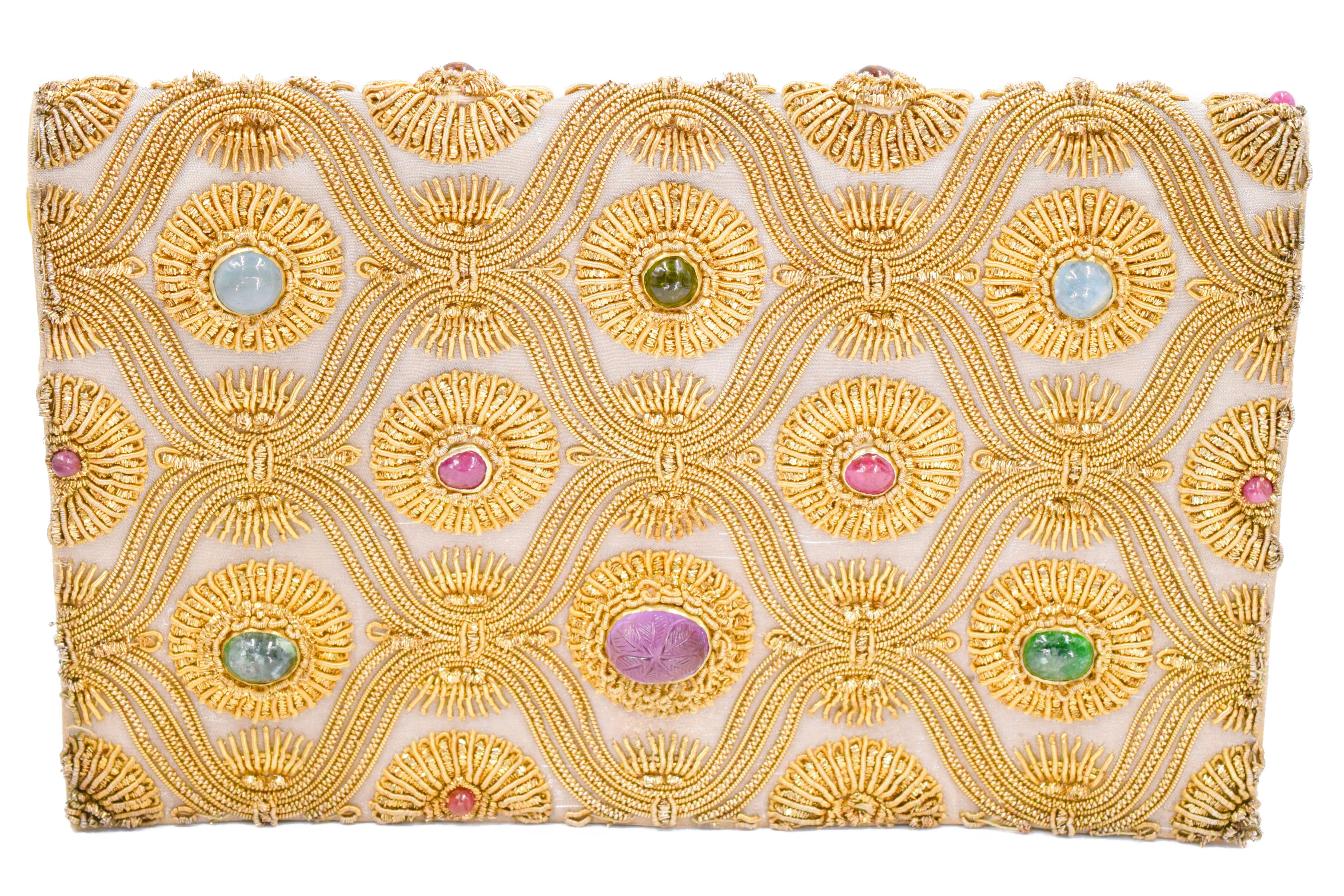 Vintage Van Cleef and Arpels  double sided gemstone jeweled clutch.
 This is similar to the one that was gifted to the MET in 1986 by the Estate of H.R.H Duke and Duchess of Windsor in 1986 .  
 7 3/4” x 5 7/8”