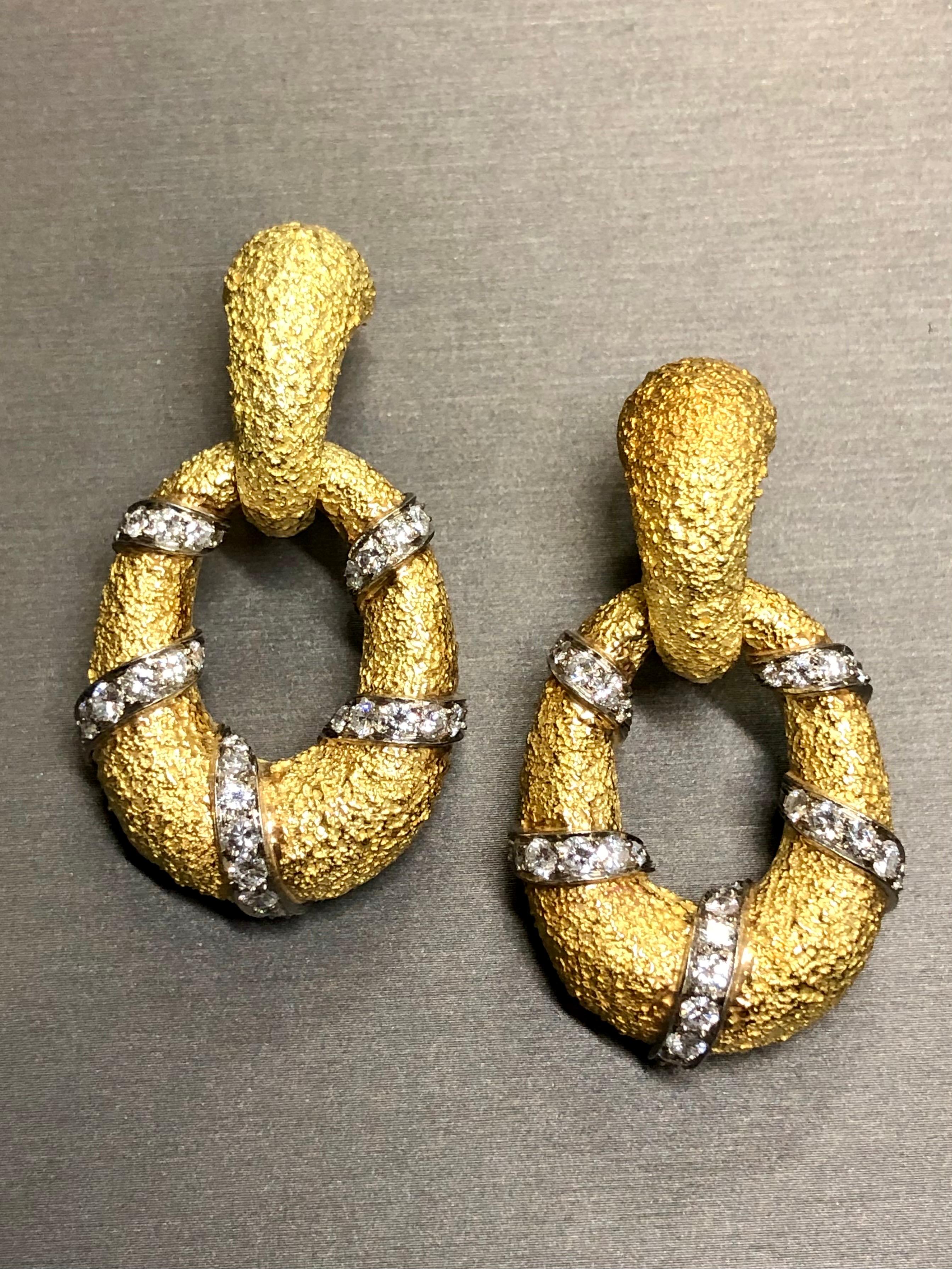 These earrings exhibit the fine detail and craftsmanship that only Van Cleef and Arpels (FRANCE) can produce. Finely made in 18K textured yellow gold, they have been set with only the finest diamonds totaling approximately 2.70cttw.