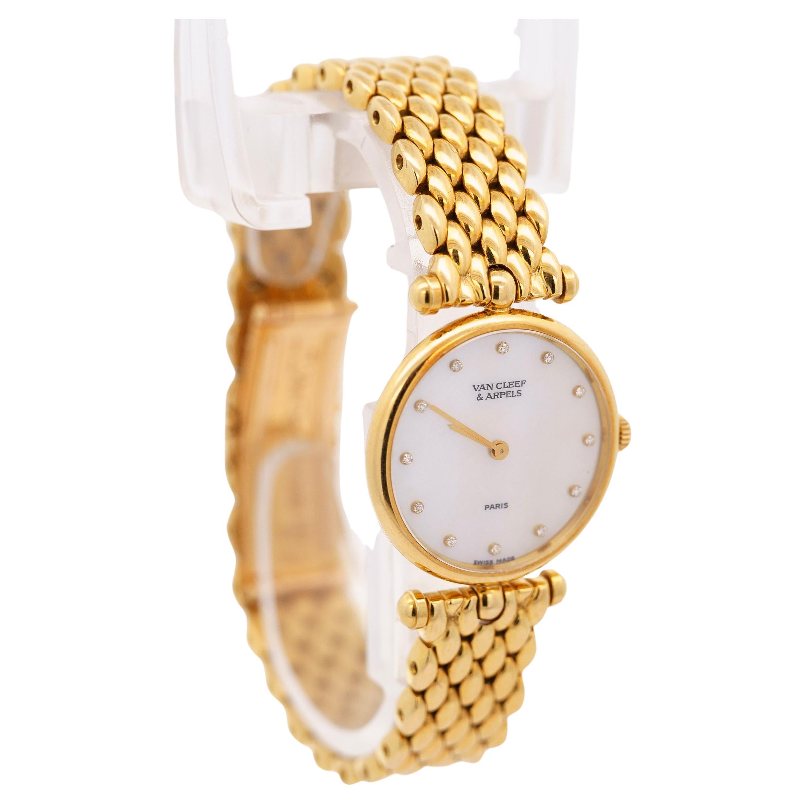 Vintage Van Cleef and Arpels Solid Gold Mother of Pearl and Diamonds Ladies Watch. Made with all original parts and movement. Maintained in excellent condition.

18k solid gold Van Cleef and Arpels Ref. 18601 ladies' watch. Smooth bezel with factory