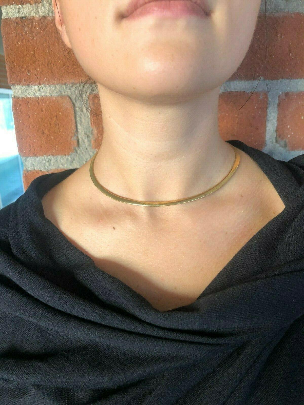 Simple elegance and iconic Snake design from Van Cleef & Arpels, circa 1970s. Made of polished 18k gold.
Perfect for layering or wearing by itself - and even as a wrap bracelet as you can see on the pic. 
Features a loop inside to hang a charm or