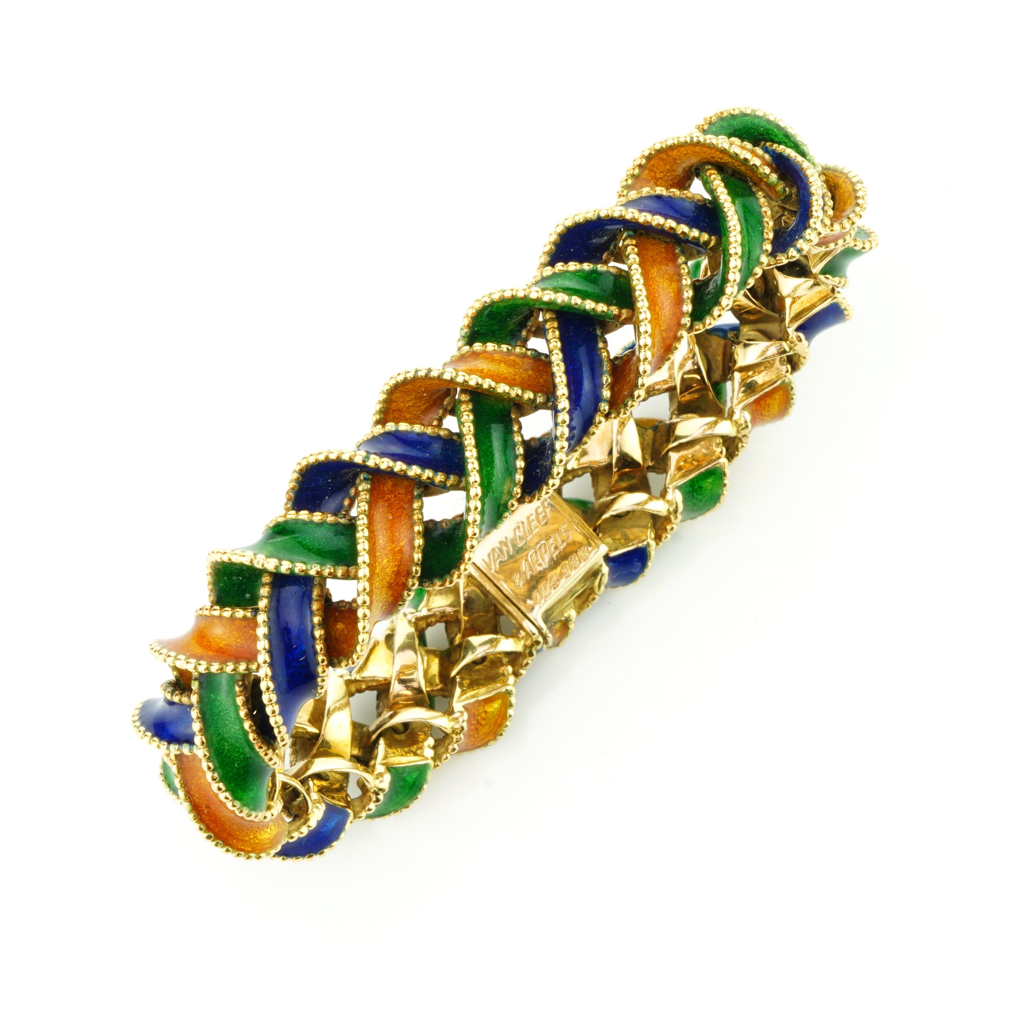 Vintage Van Cleef & Arpels 18kt. yellow gold. and coloured enamel plait design bracelet.
Designer: Van Cleef & Arpels
Made in 1960's
Fully hallmarked, with V&A hallmark, 750 mark, eagle's head, number. 103.999

Dimensions -
Finger Size (UK) = M (US)