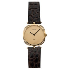 Vintage Van Cleef 
Arpels 1980 a carica manuale con quadrante champagne in oro giallo 18 carati Diam