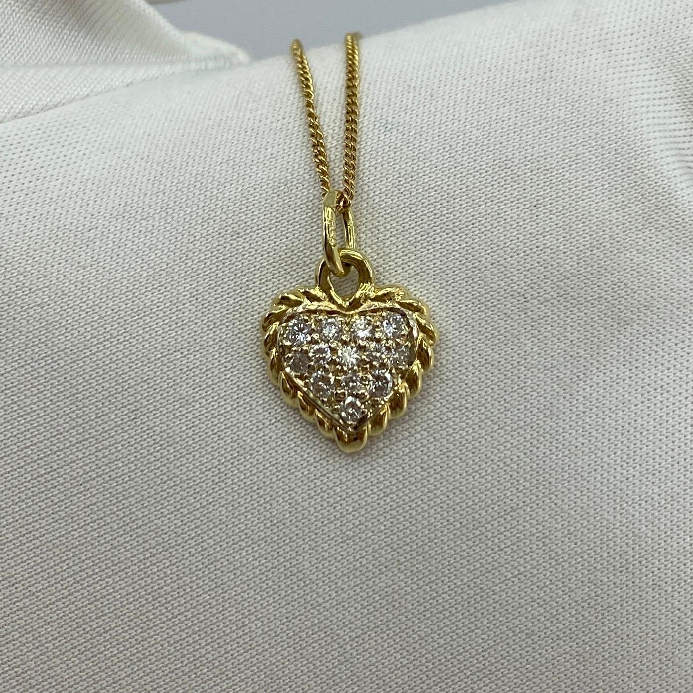 Vintage Van Cleef & Arpels Alhambra Diamond 18k Gold Heart Pendant.

A classic pave diamond set heart pendant on a fine 18kt yellow gold chain necklace by Van Cleef & Arpels. The heart is set with 13 brilliant round cut diamonds and measures approx.