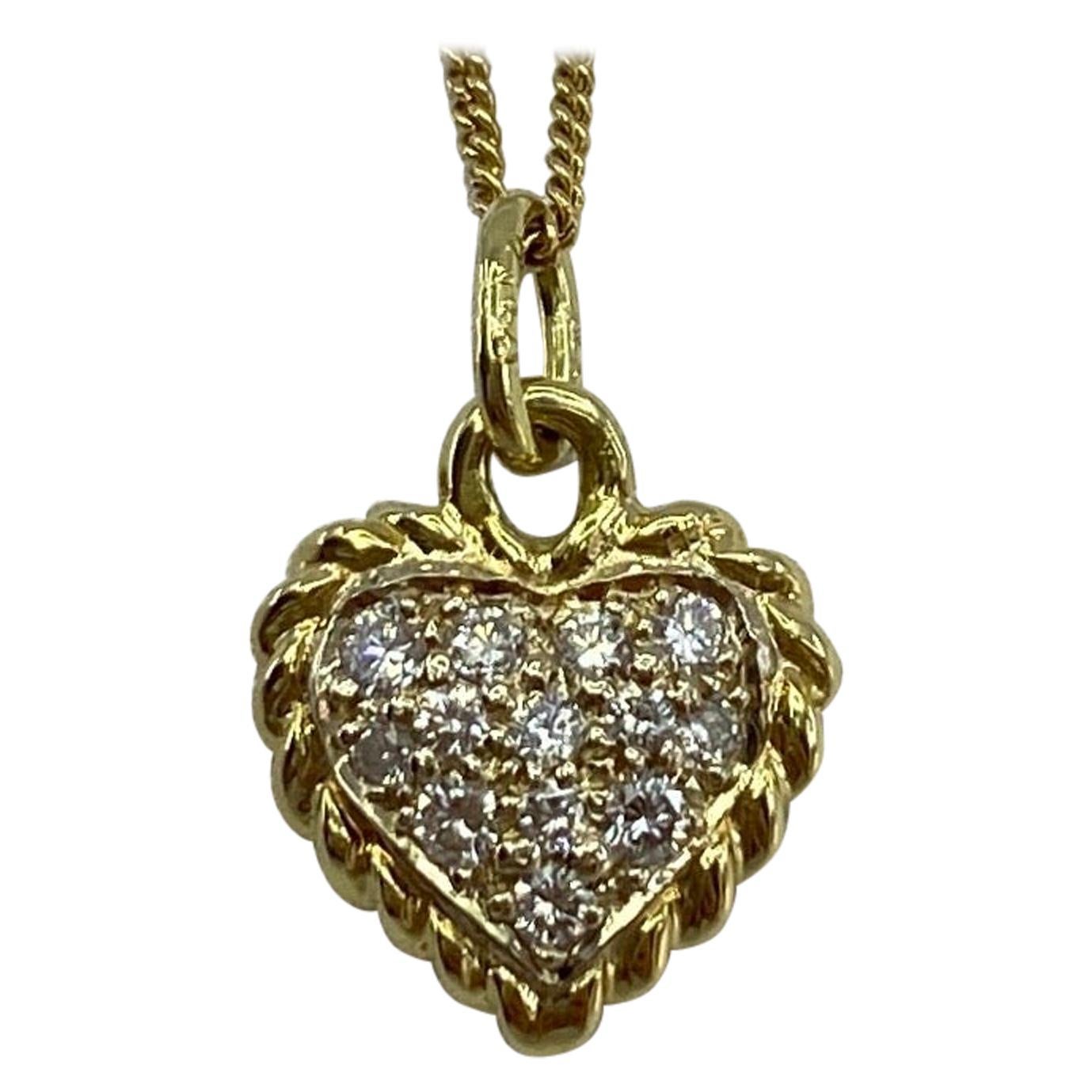 Van Cleef and Arples 18 Karat Gold Diamond Sweet Alhambra Mini Pendant 0.08 Carat at 1stDibs