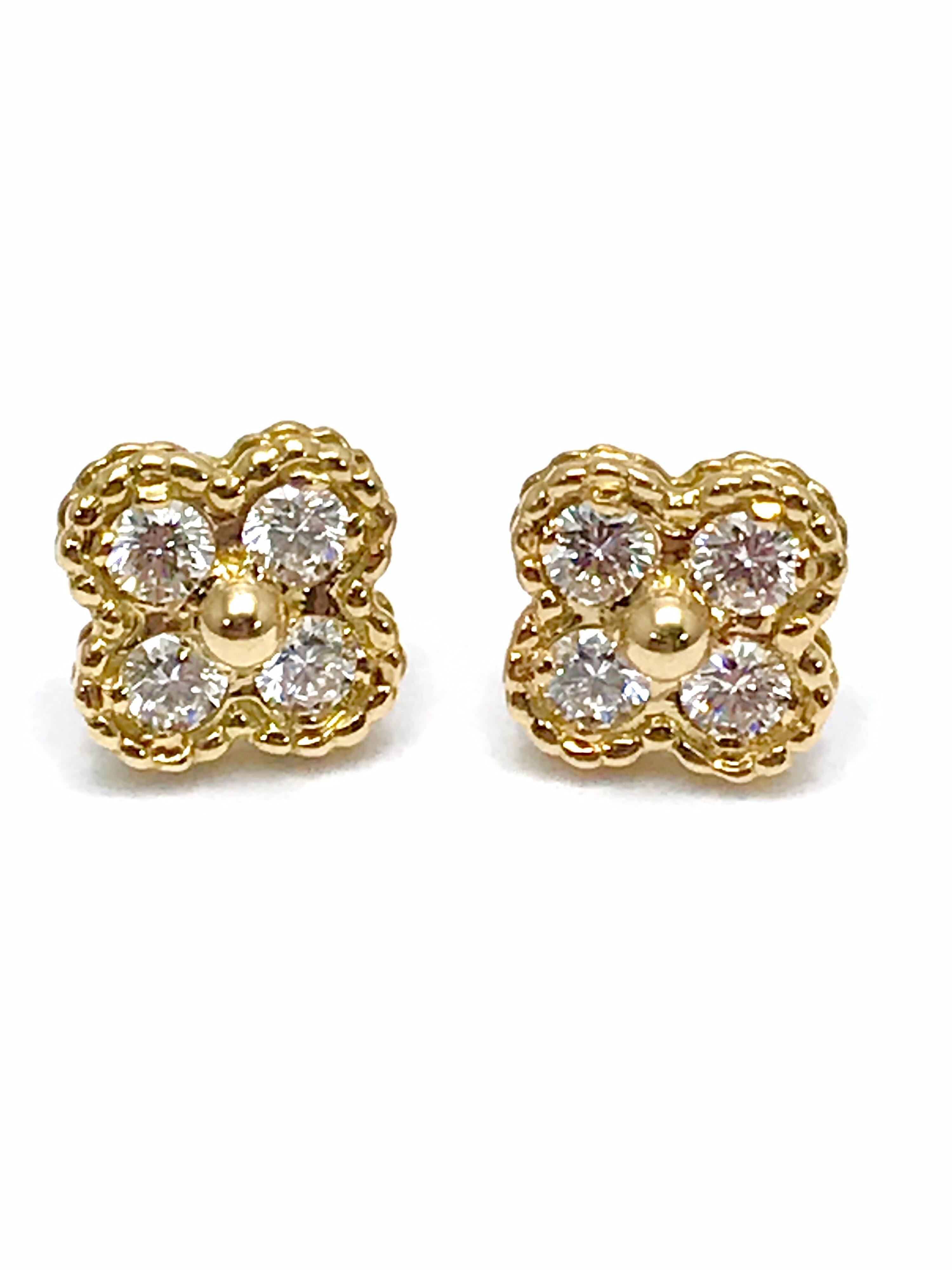 A gorgeoius pair of vintage Van Cleef & Arpels Alhambra Diamond and 18K yellow gold earrings.  These are an iconic piece from the collection.  There are eight round brilliant Diamonds weighing 0.56 carats that are E color, VVS clarity.  The earrings